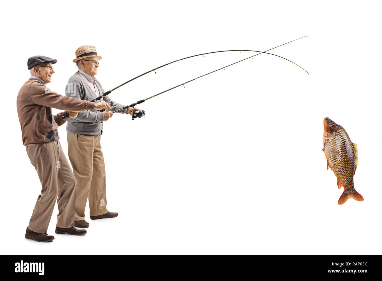 Full length shot of two senior fishermen with a big carp on a fishing rod isolated on white background Stock Photo