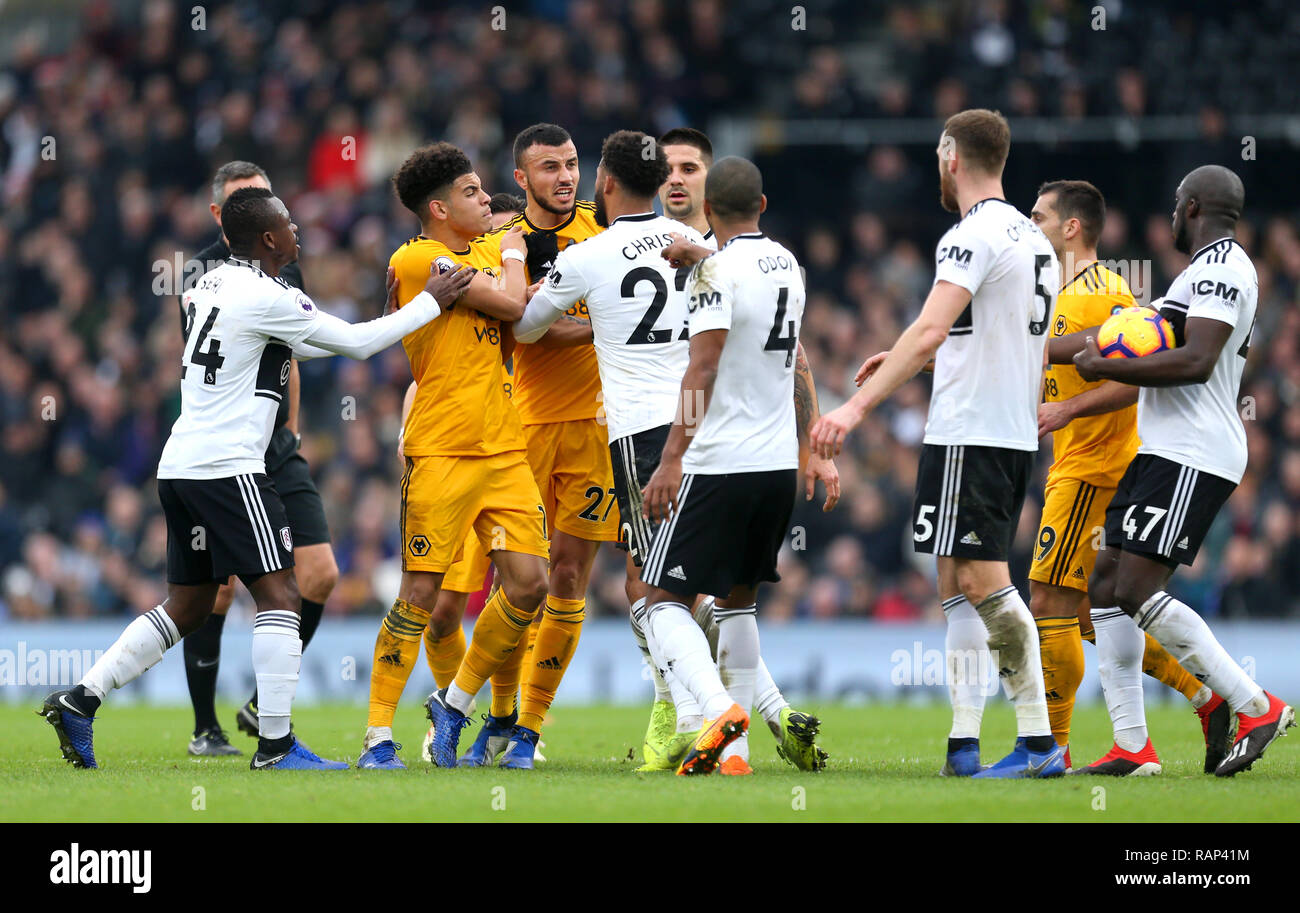 Wolverhampton Wanderers' Romain Saiss (third left) clashes with Fulham ...