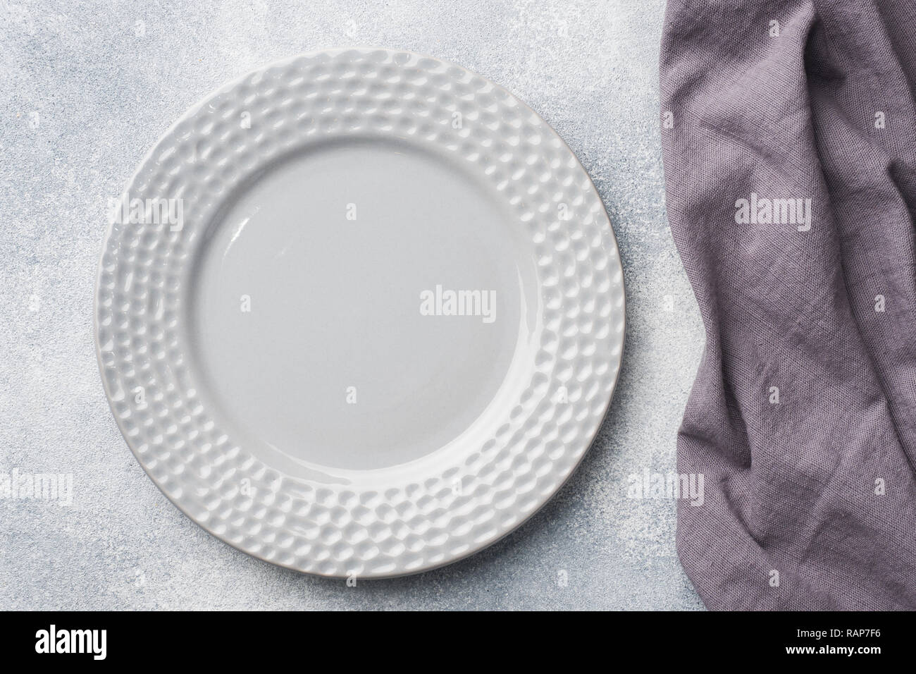 Empty plate on cement background. Top view with copy space Stock Photo ...