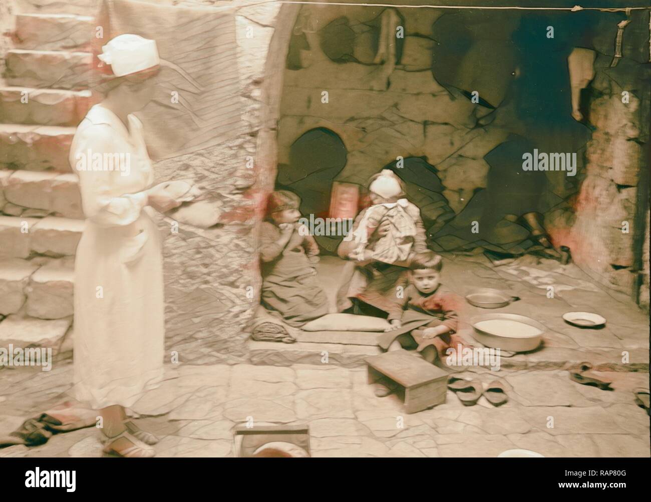 The raising of the siege of Jerusalem. Scene in the courtyard of a poor  Muslim Home, showing Mrs. F. Vester reimagined Stock Photo - Alamy