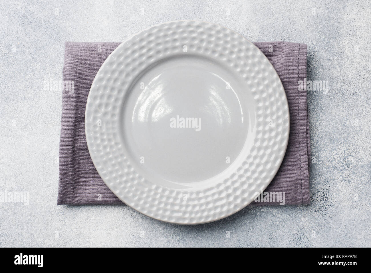 Empty plate on cement background. Top view with copy space Stock Photo ...