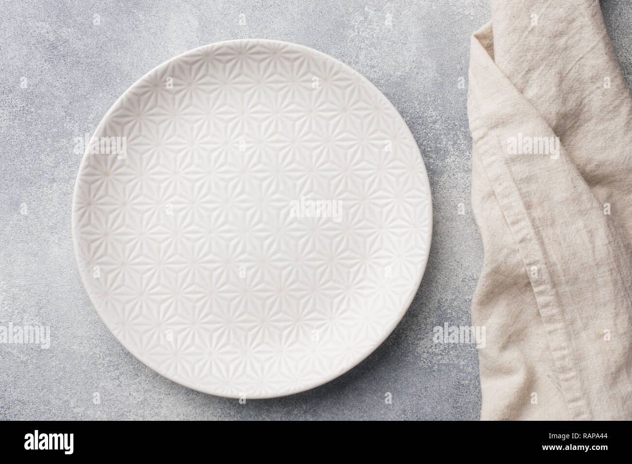 Empty plate on cement background. Top view with copy space Stock Photo ...