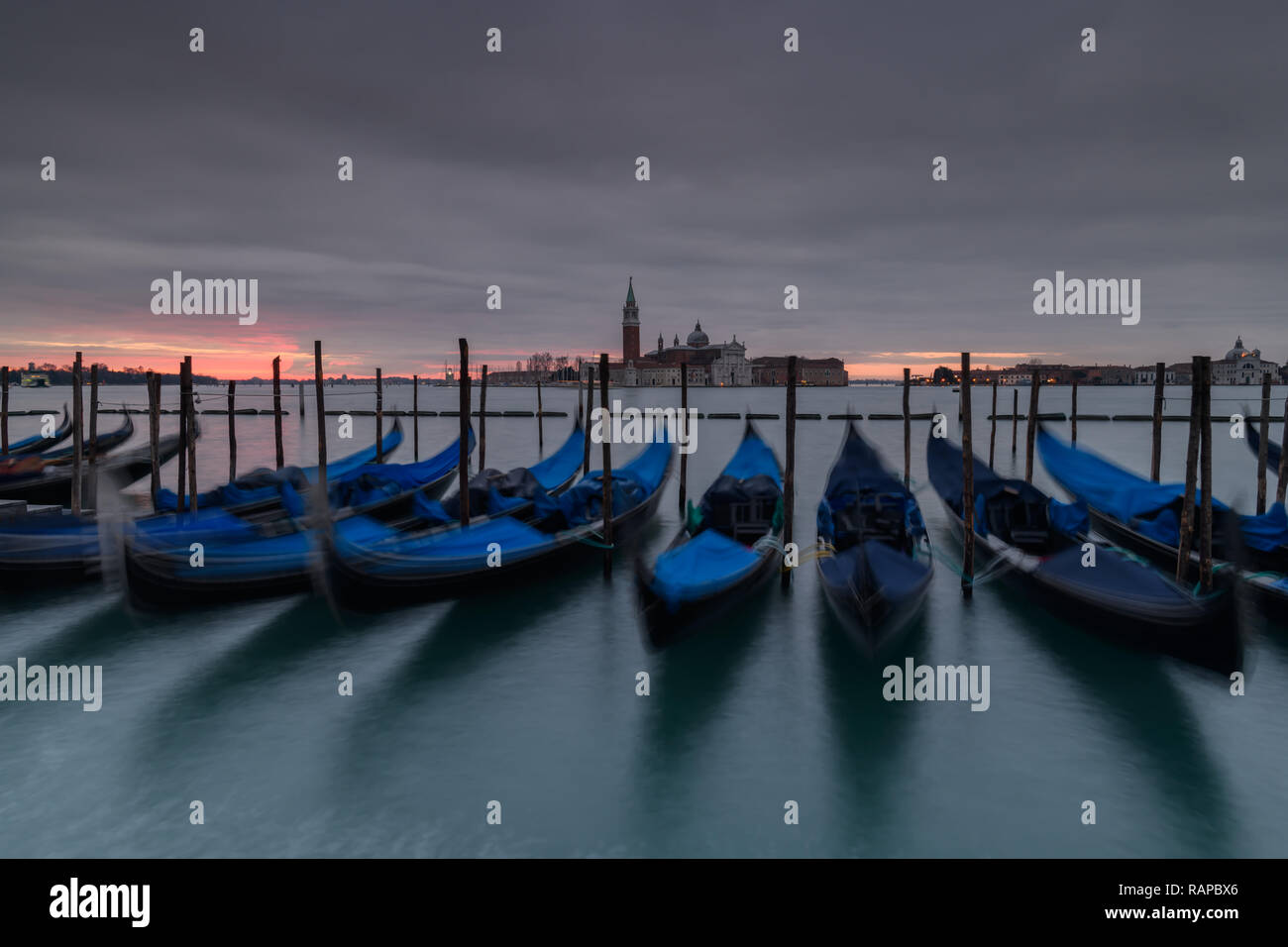 Sunrise in Venice, Italy with Gondolas Stock Photo - Alamy