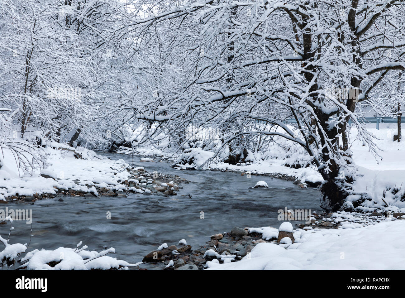 Winter landscape with a river and frosty trees Stock Photo - Alamy