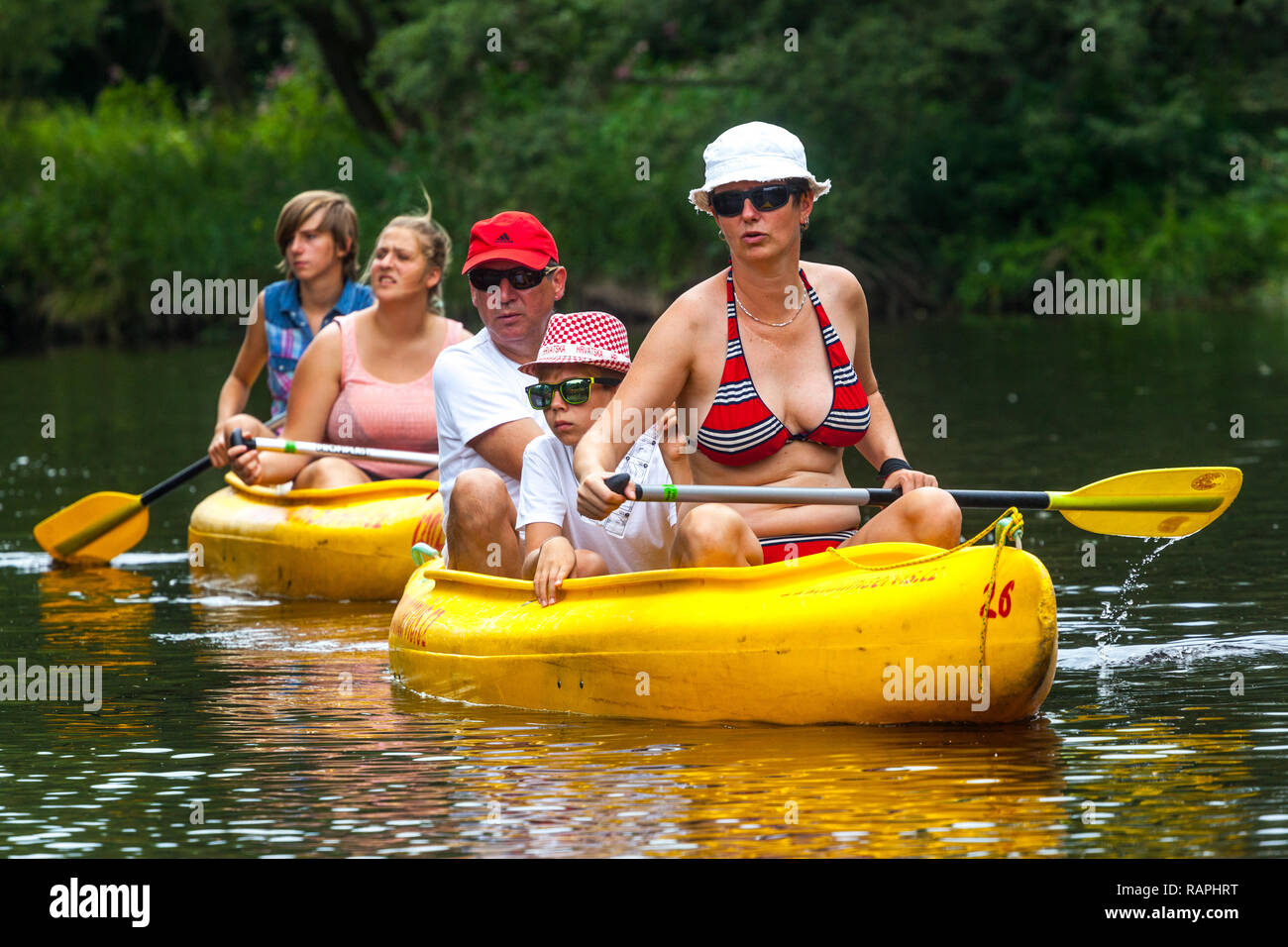 Family canoeing river, summer adventures, Czech Republic Stock Photo