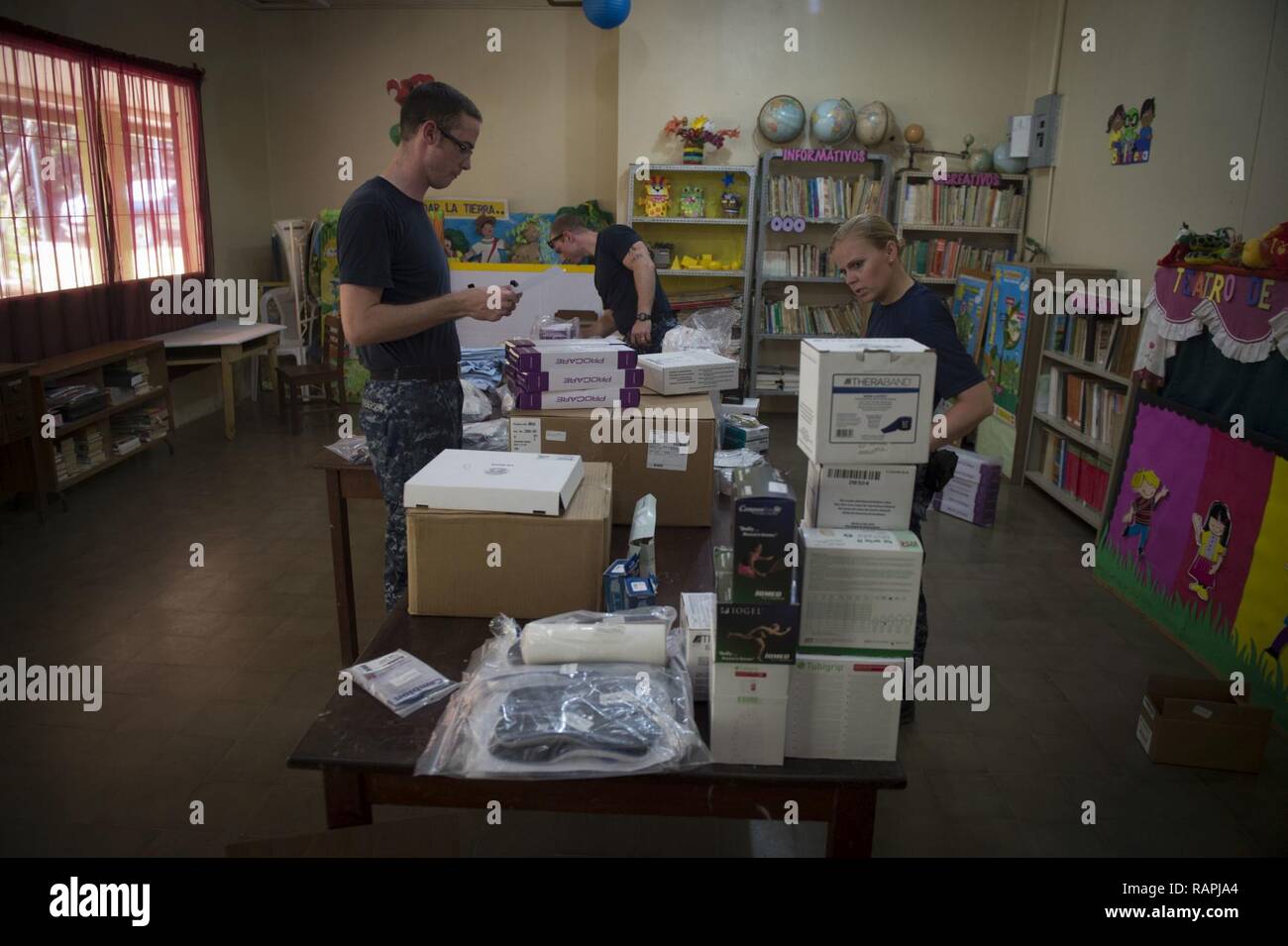 TRUJILLO, Honduras (Feb. 20, 2017) – Sailors organize medical supplies at the Continuing Promise 2017 (CP-17) medical site in support of CP-17's visit to Trujillo, Honduras. CP-17 is a U.S. Southern Command-sponsored and U.S. Naval Forces Southern Command/U.S. 4th Fleet-conducted deployment to conduct civil-military operations including humanitarian assistance, training engagements, and medical, dental, and veterinary support in an effort to show U.S. support and commitment to Central and South America. Stock Photo