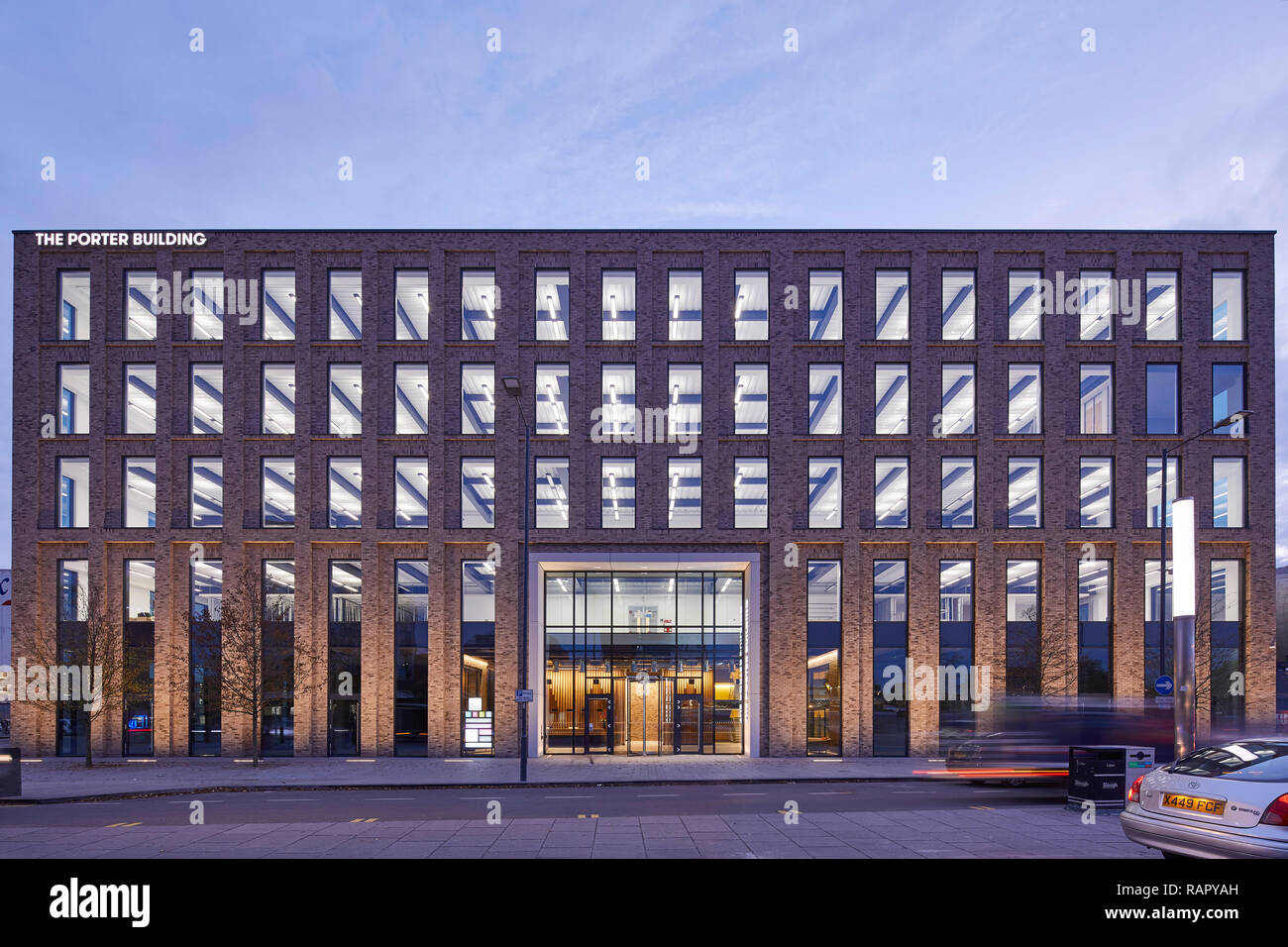 Front elevation of Porter House Building at dusk. The Porter Building