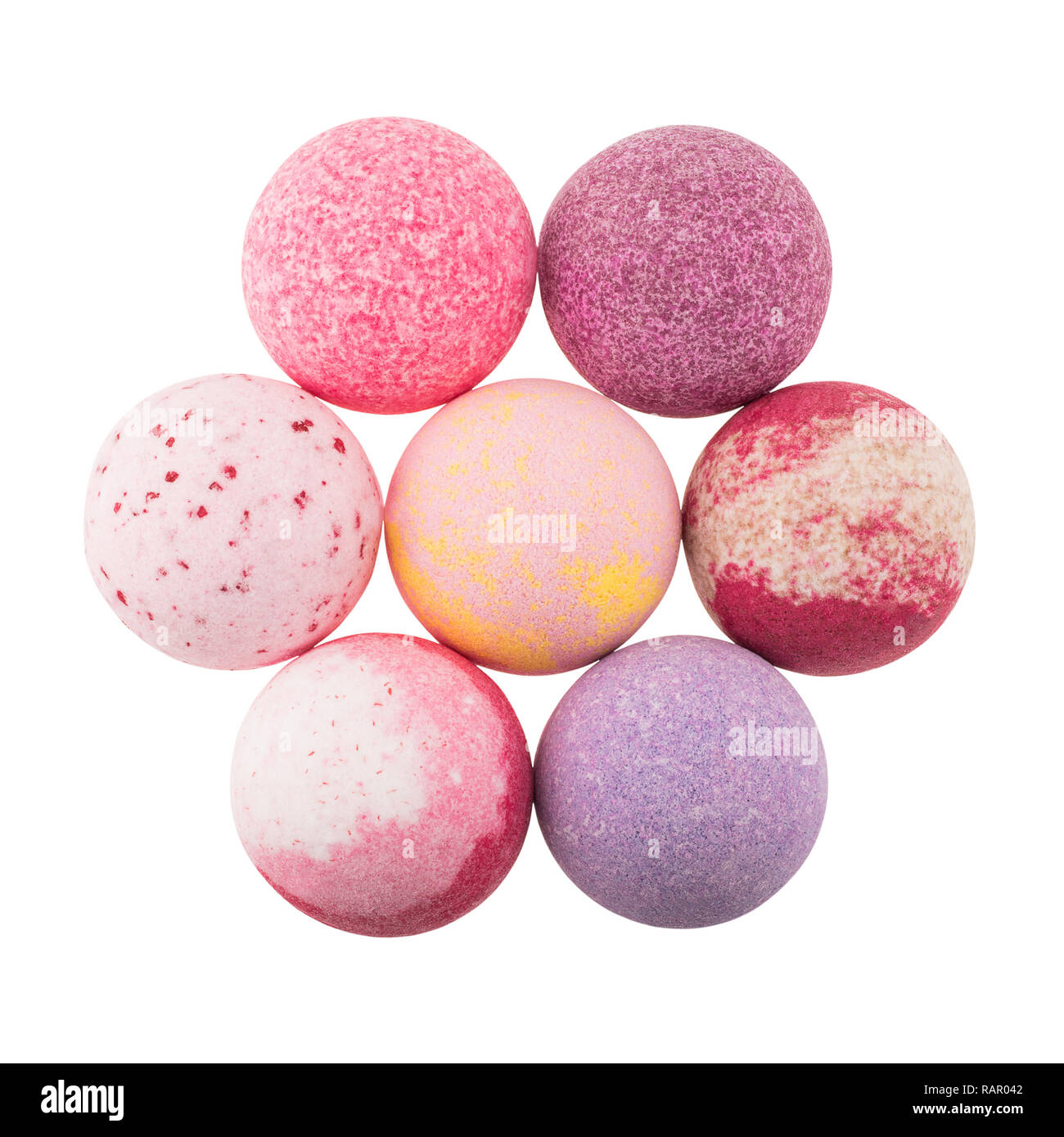Composition of variegated bath bombs isolated over white Stock Photo