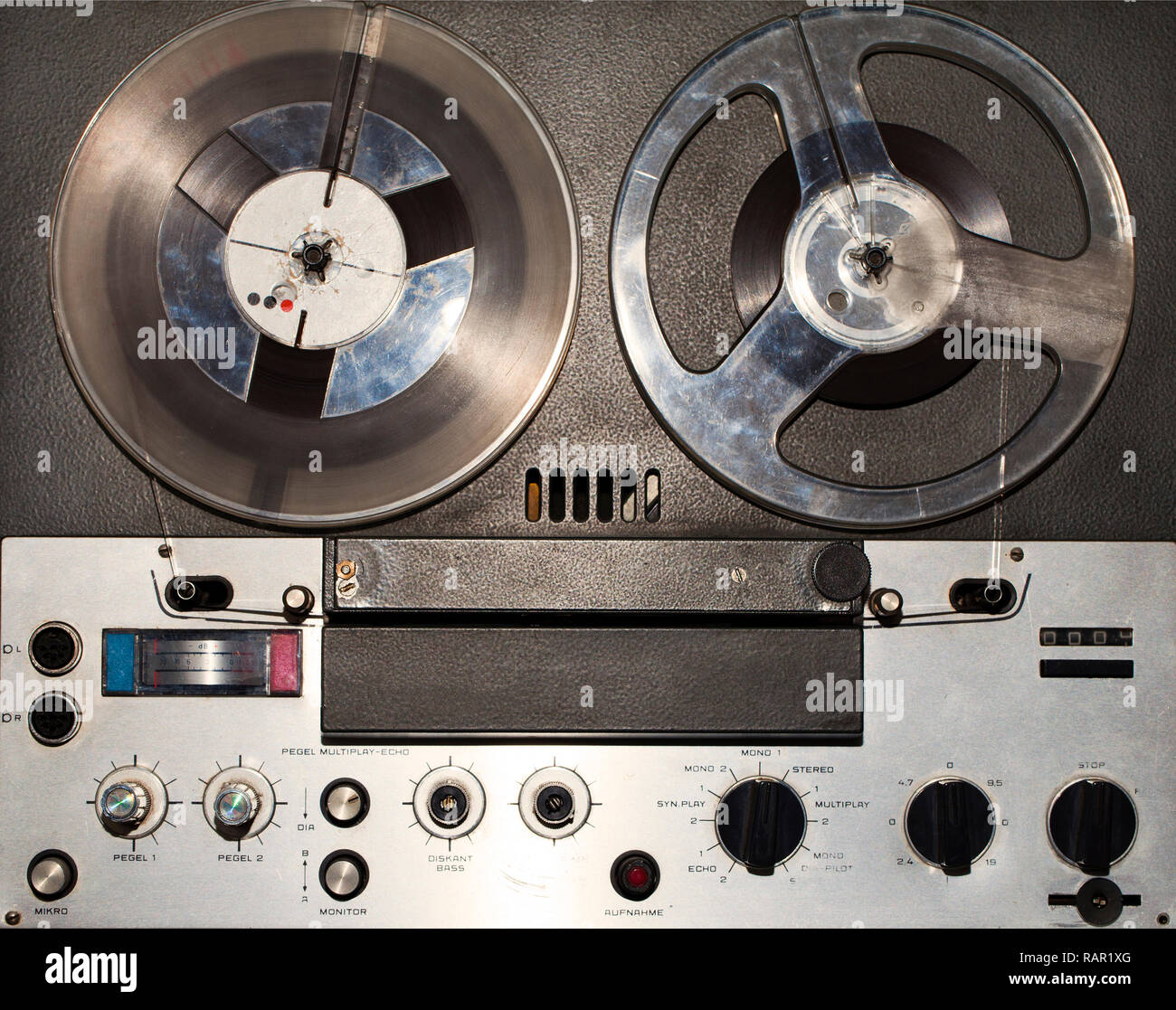 Vintage Reel to Reel tape recorder playing music close up of reel Stock  Photo