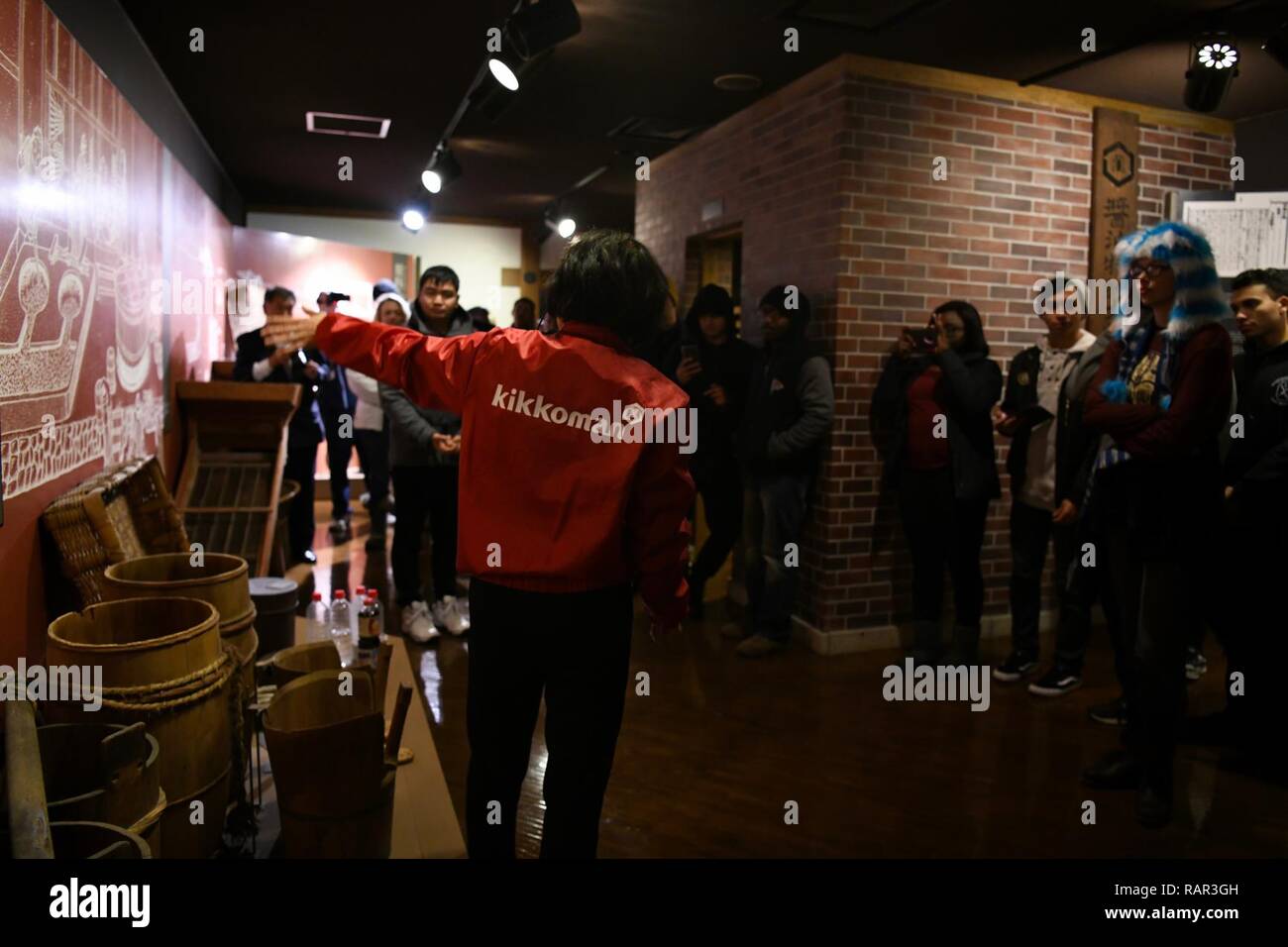 CHITOSE, Japan A local soy sauce factory tour guide, explains the