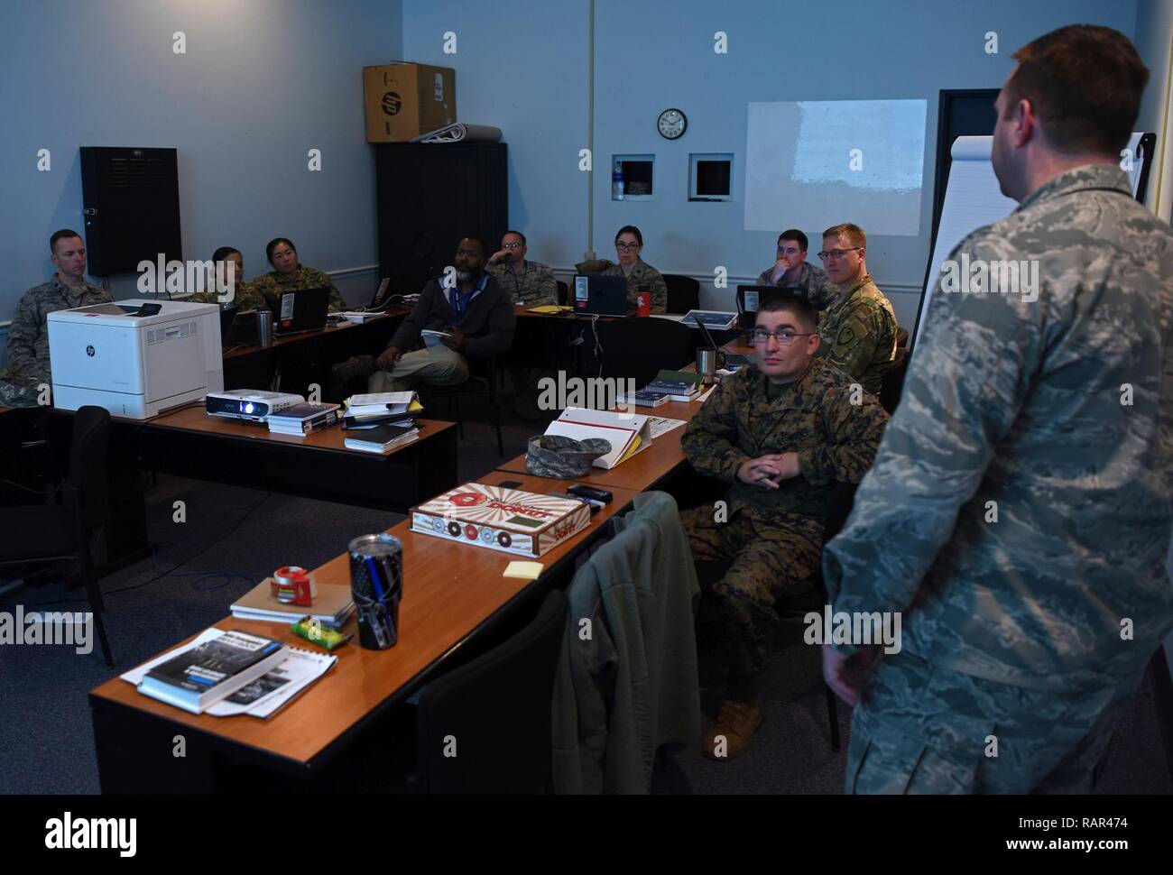 U.S. military and civilian members participate in one of the four operational planning teams (OPT) during Mission Readiness Exercise (MRX) 19-2, Dec. 11, 2018, Shaw Air Force Base, S.C. The role of the OPT is to direct planning efforts, including implementation of plans and orders, as part of the Joint Planning Process during the exercise. MRX 19-2 is an initial operational certification event designed to demonstrate Ninth Air Force’s ability to effectively plan, prepare, execute and assess Combined Joint Task Force operations at the operational level of war as tasked by the Air Force Chief of Stock Photo