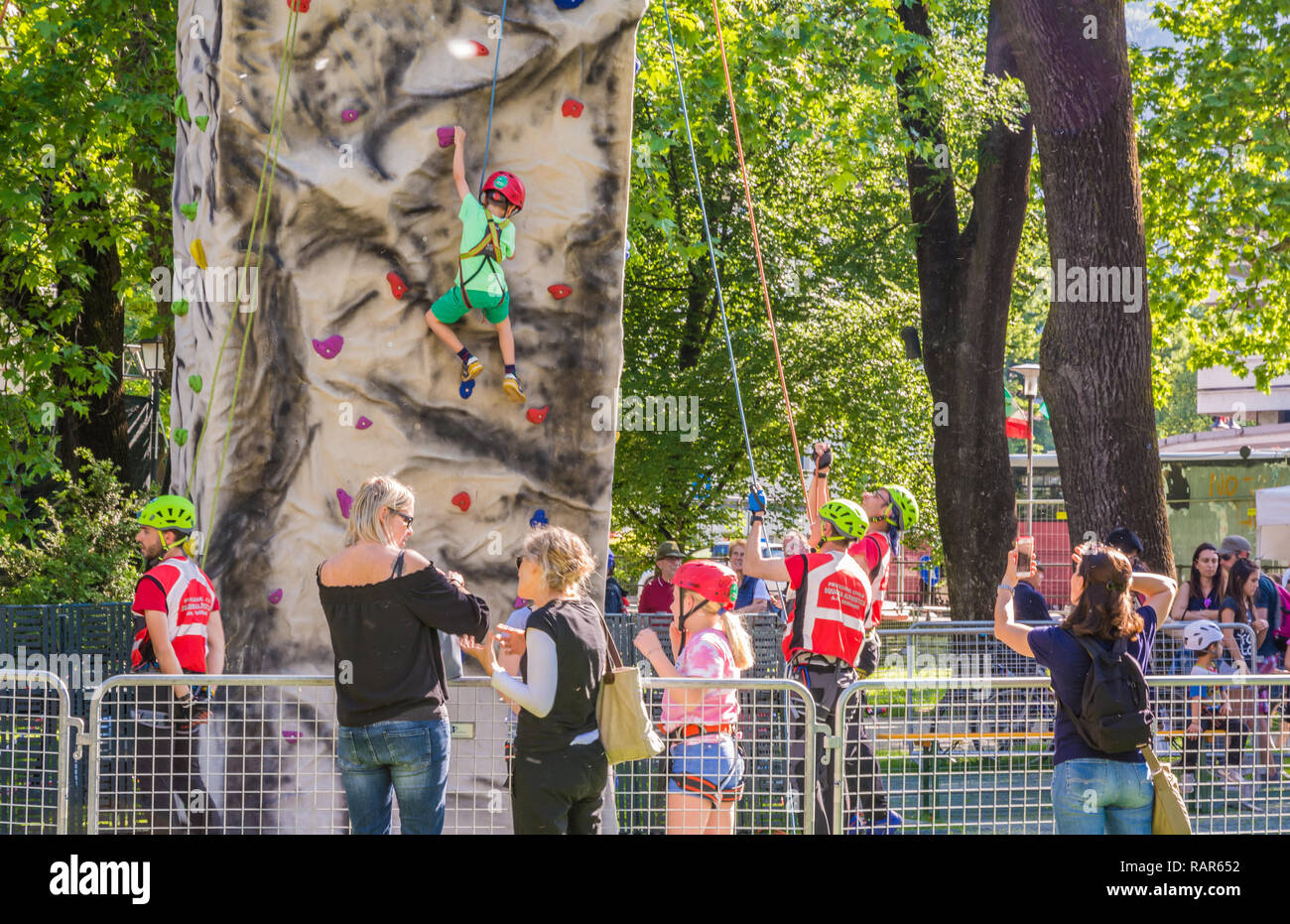 Boy climbing wall harness hi-res stock photography and images - Alamy