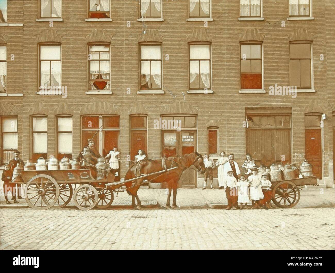 Melkhandel Spaan, with two horse and carts, Barendrecht, The Netherlands, J.W. Pronk, 1890 - 1920. Reimagined Stock Photo