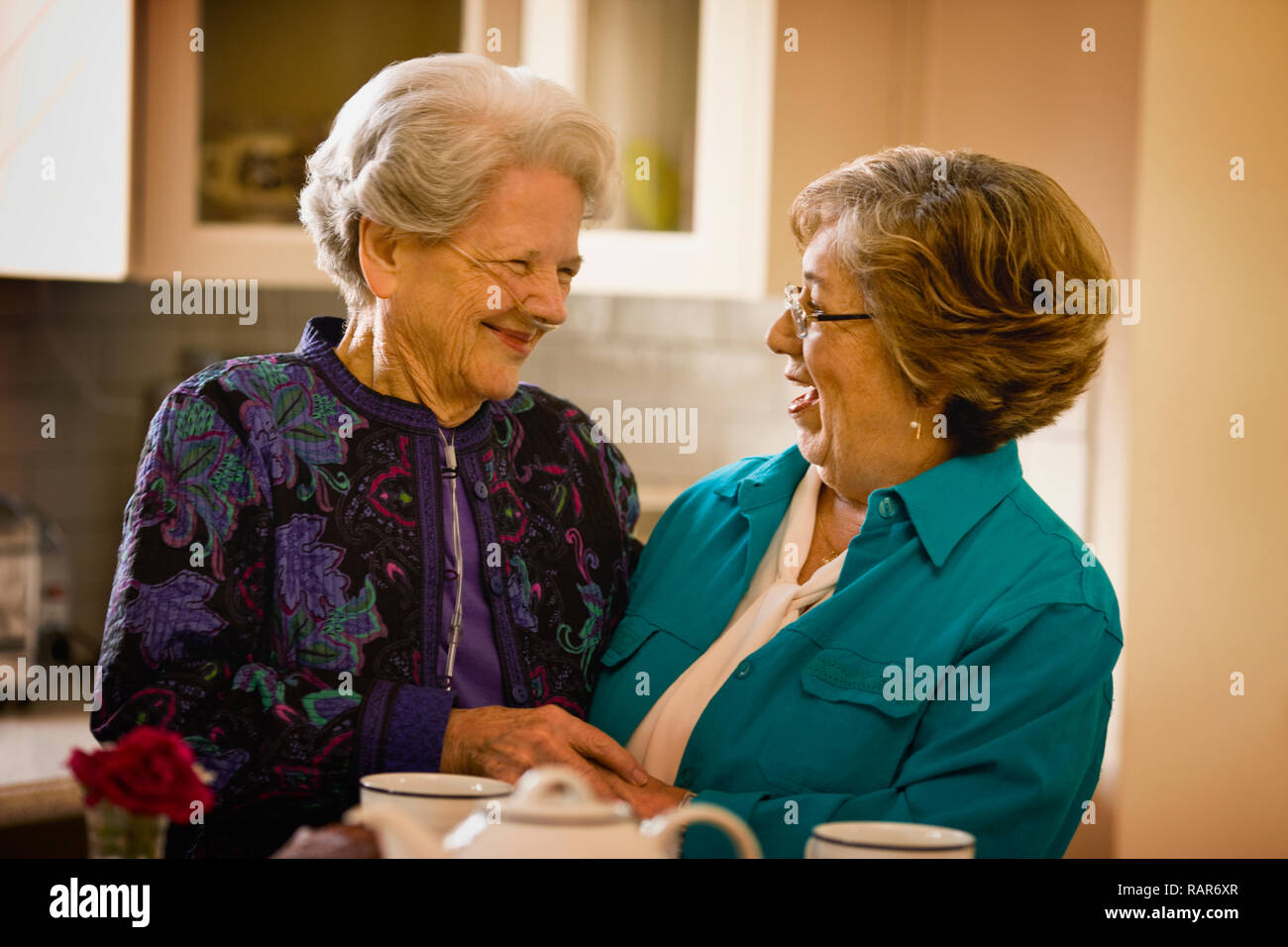 Senior woman with an oxygen nose hose (cannula) and a mature women