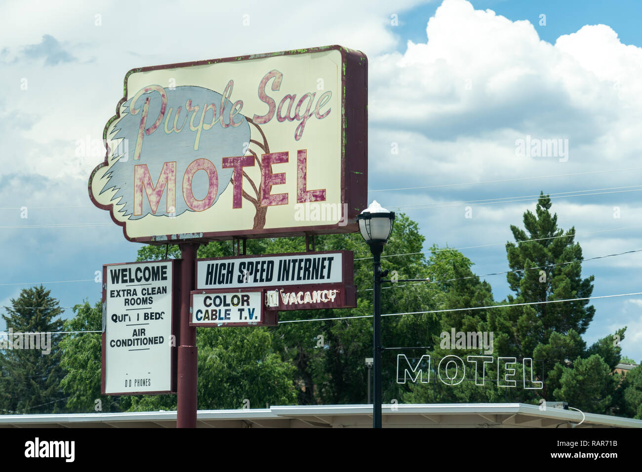 Vintage retro sign for the Purple Sage Motel. Lodging has vacancy. July 16 2018 - Panguitch UTAH Stock Photo