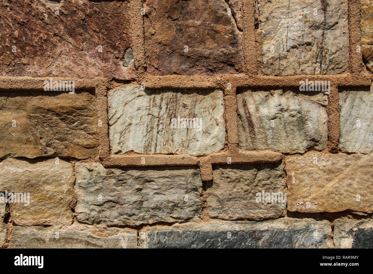 Textured wall with stone and stucco Stock Photo - Alamy