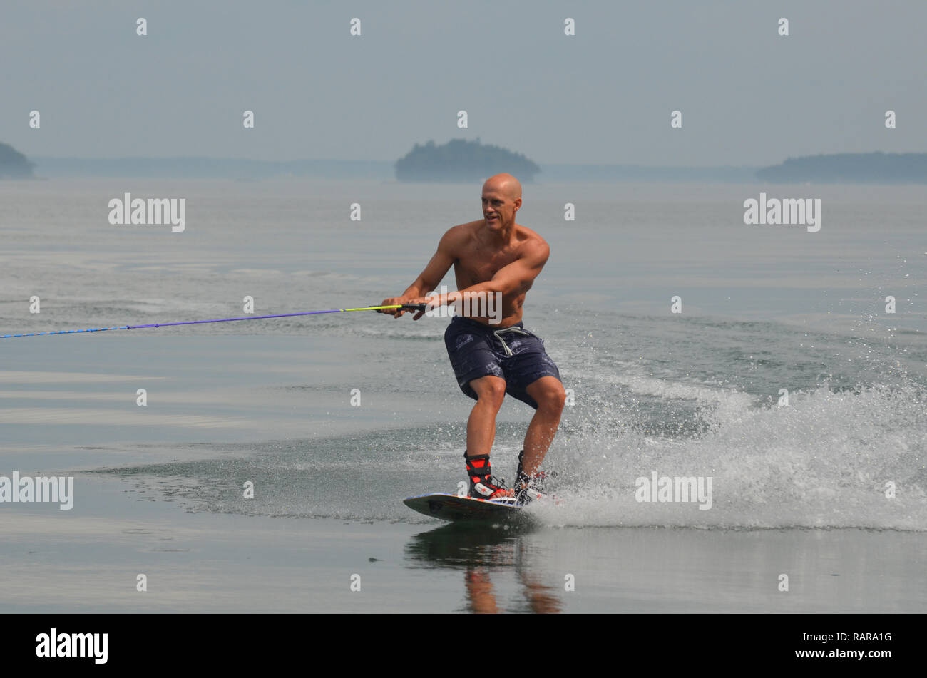 Wakeboarding on the ocean waters of Casco Bay Maine Stock Photo Alamy