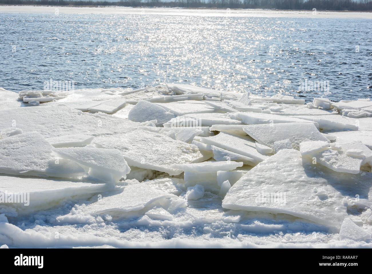 Huge chunks of ice on the river during the ice drift Stock Photo