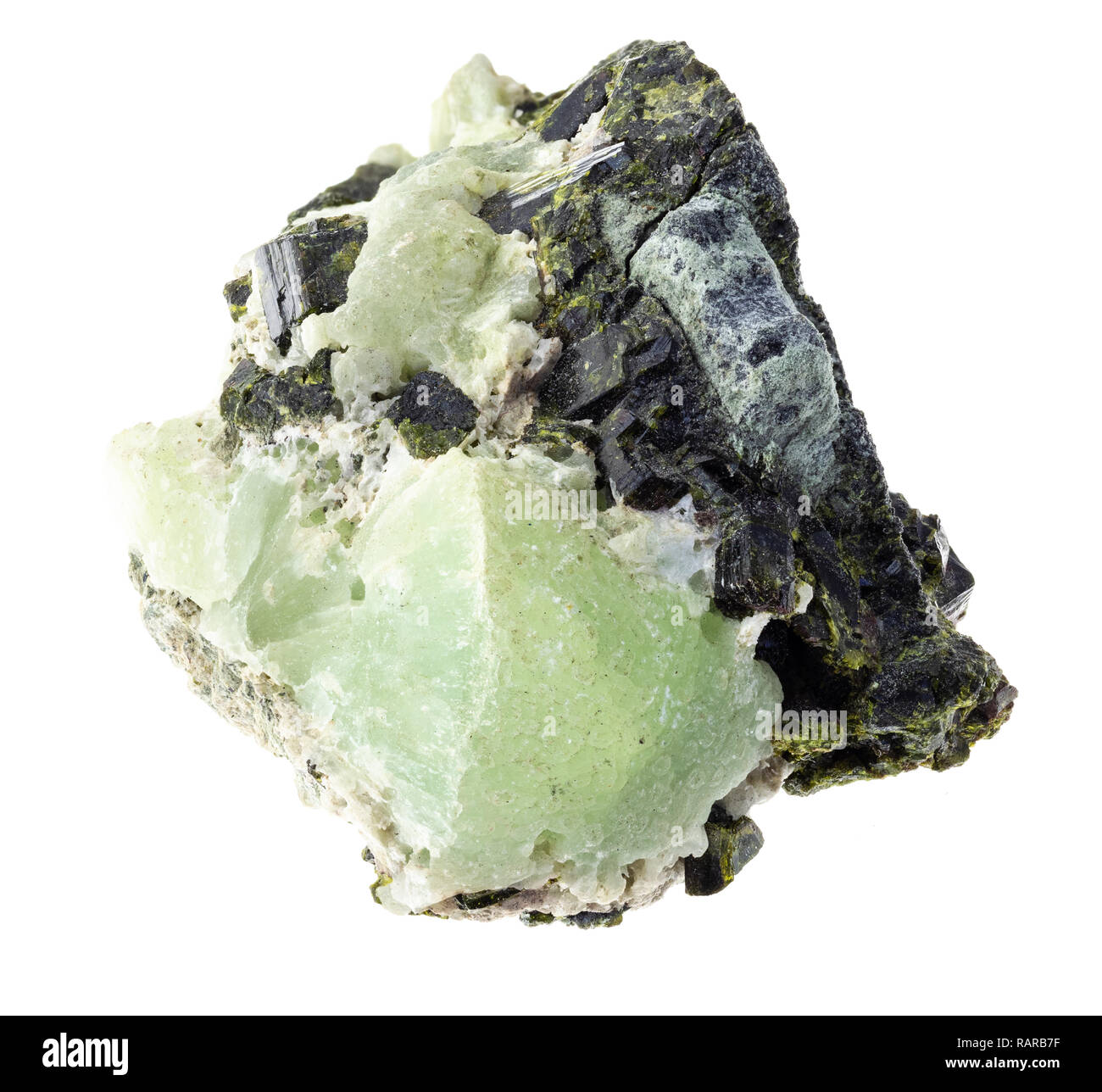 macro photography of natural mineral from geological collection - Prehnite raw stones on Epidote crystals on white background Stock Photo