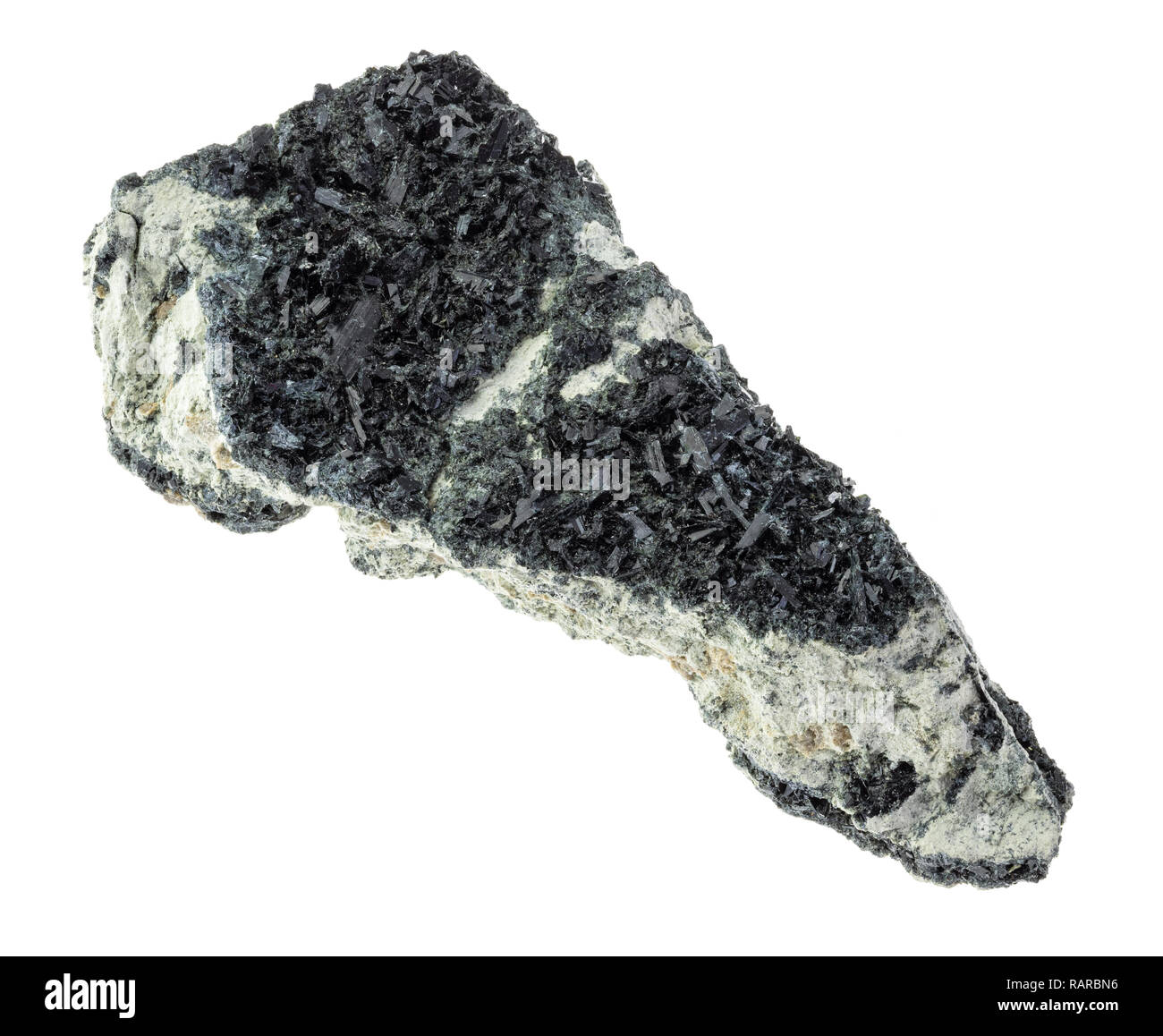 macro photography of natural mineral from geological collection - hornblende crystals on rough amphibole - carbonate rock on white background Stock Photo
