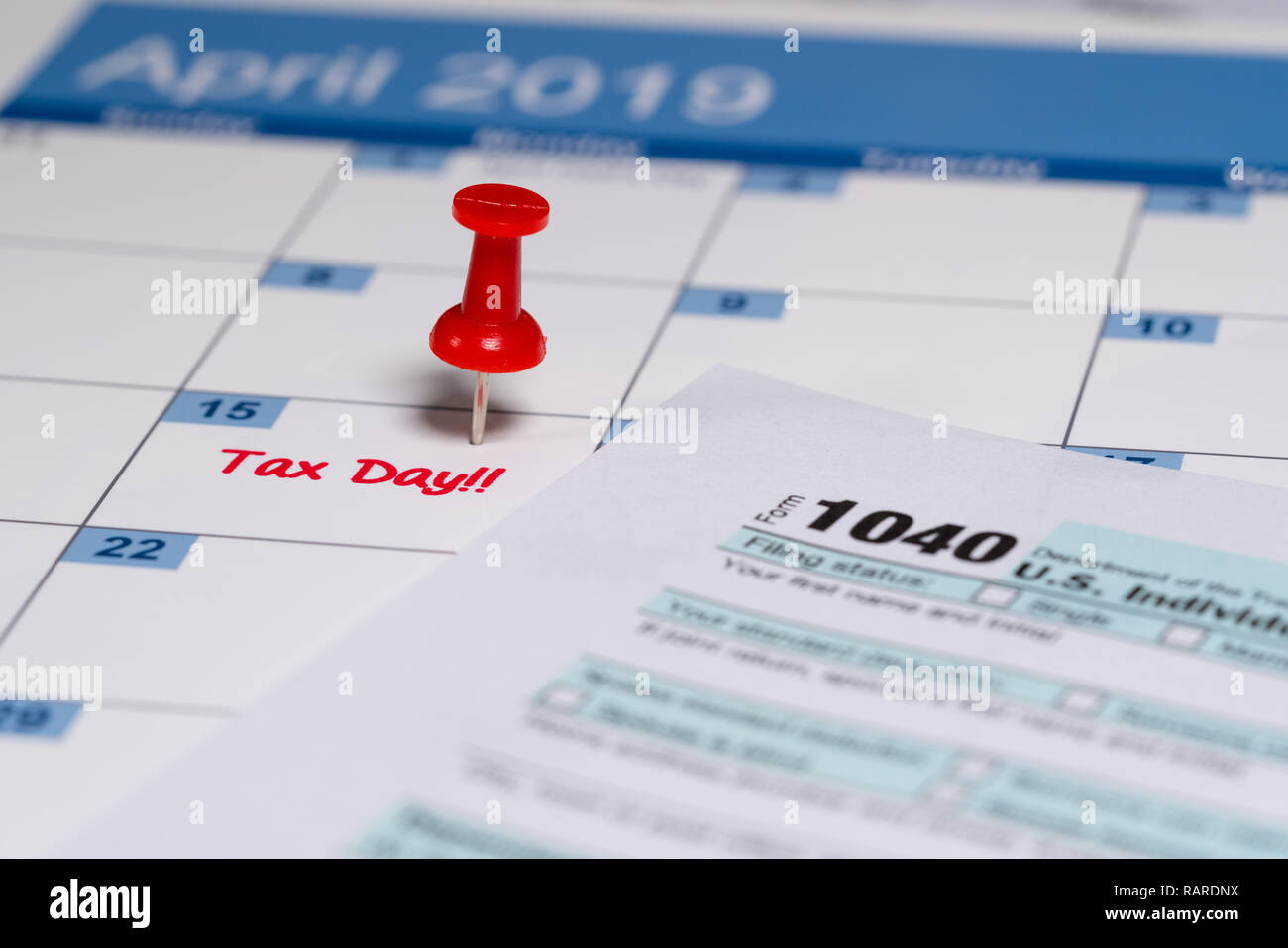 Printed copy of simplified Form 1040 for income tax return for 2018 with reminder for April 15, 2019 deadline Stock Photo