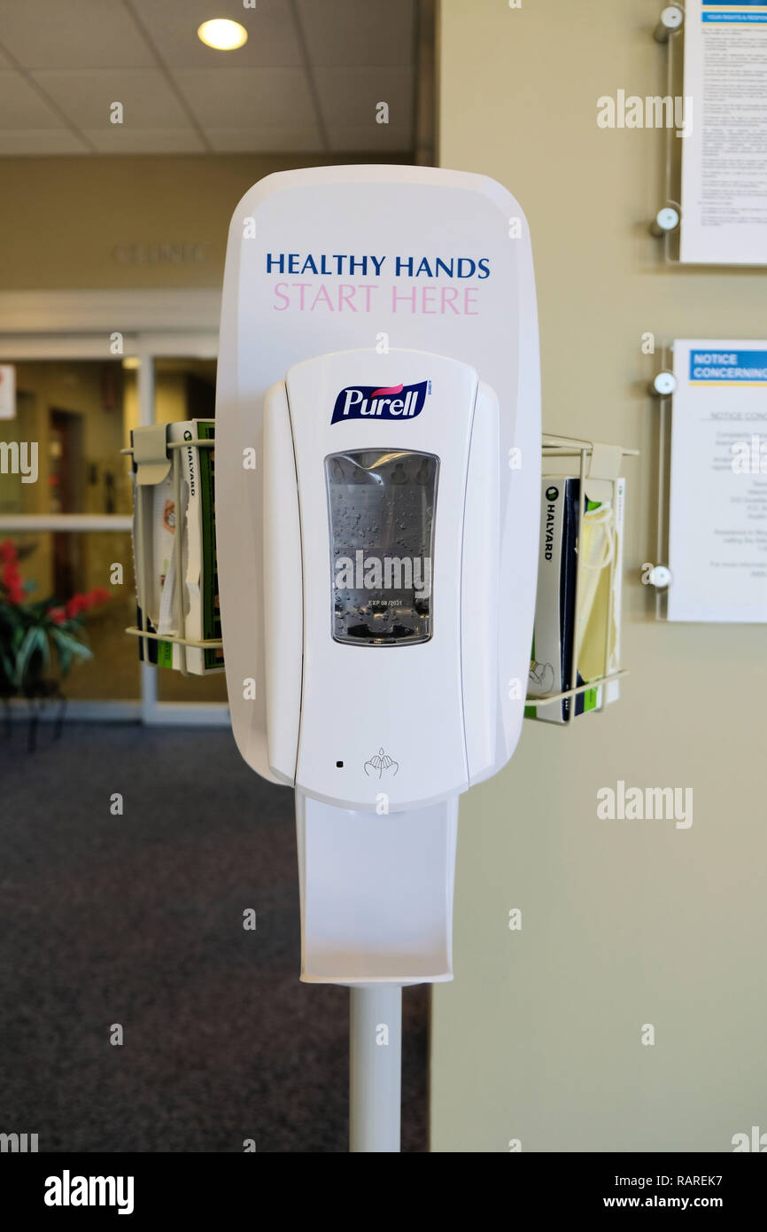 Purell hand sanitizer, antiseptic, and disinfectant dispenser at a
