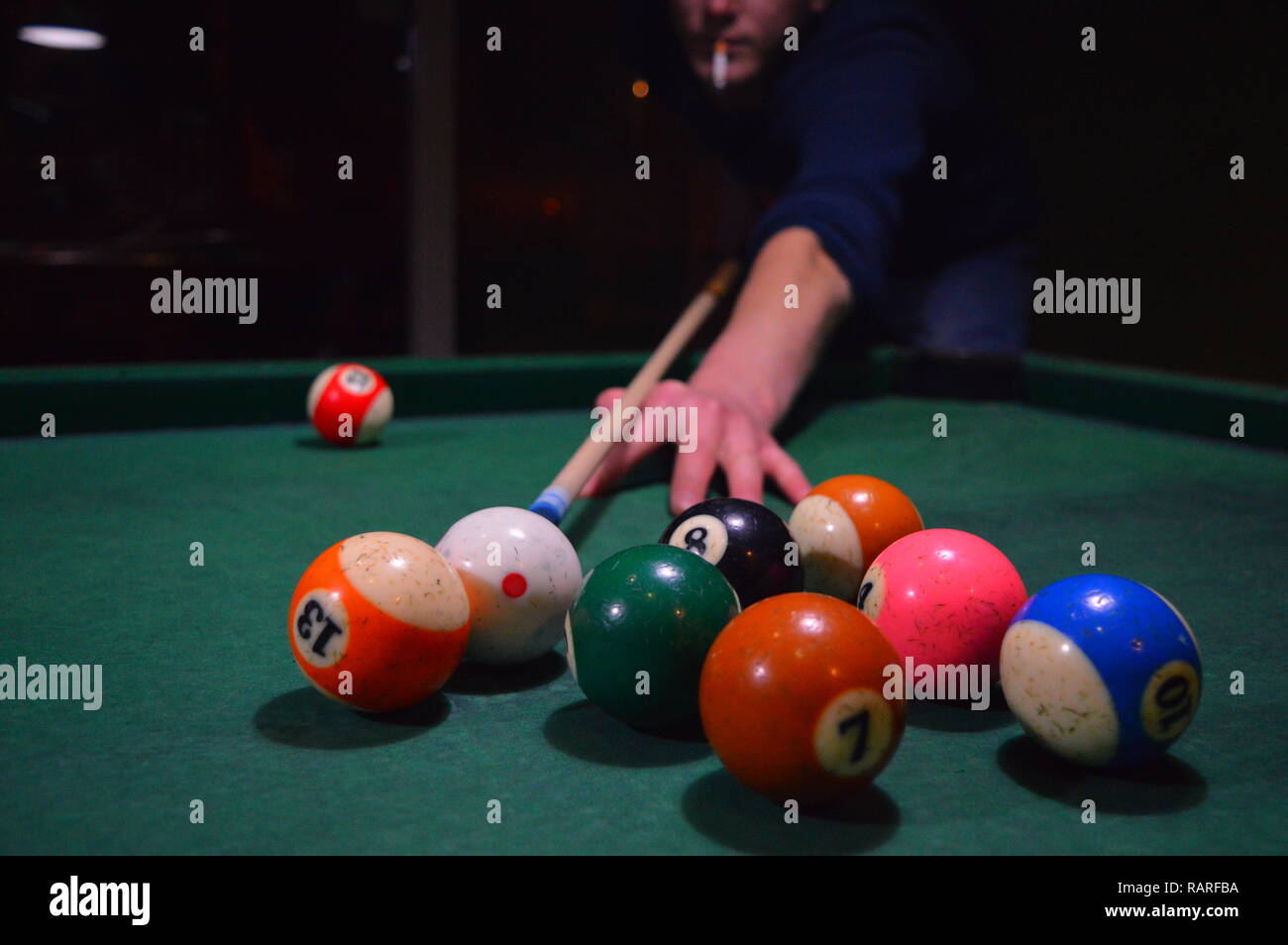 Game of pool, person playing pool and hitting balls Stock Photo Alamy