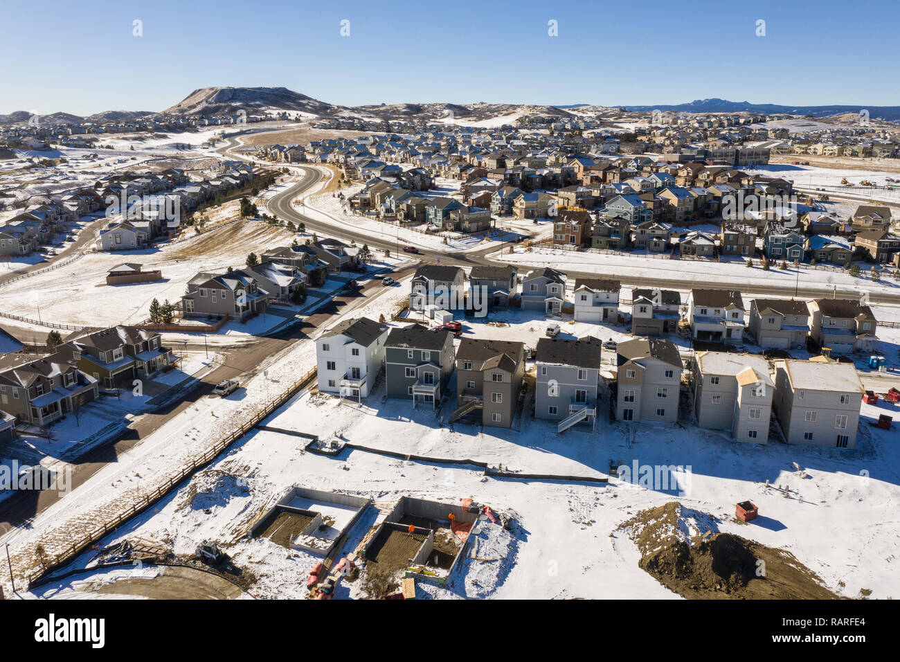 Photo illustrating the Colorado housing boom as it continues year round, including winter Stock Photo