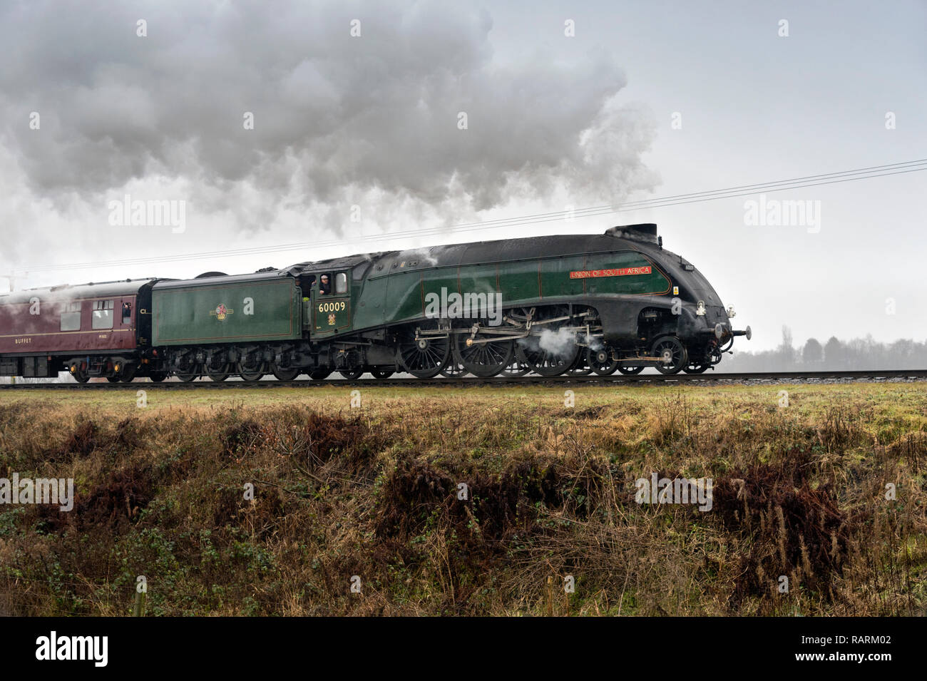 Streamlined A4 Class Steam Locomotive 'Union of South Africa' passes Burrs Country Park, Bury, Lancashire, East Lancashire Railway. Stock Photo