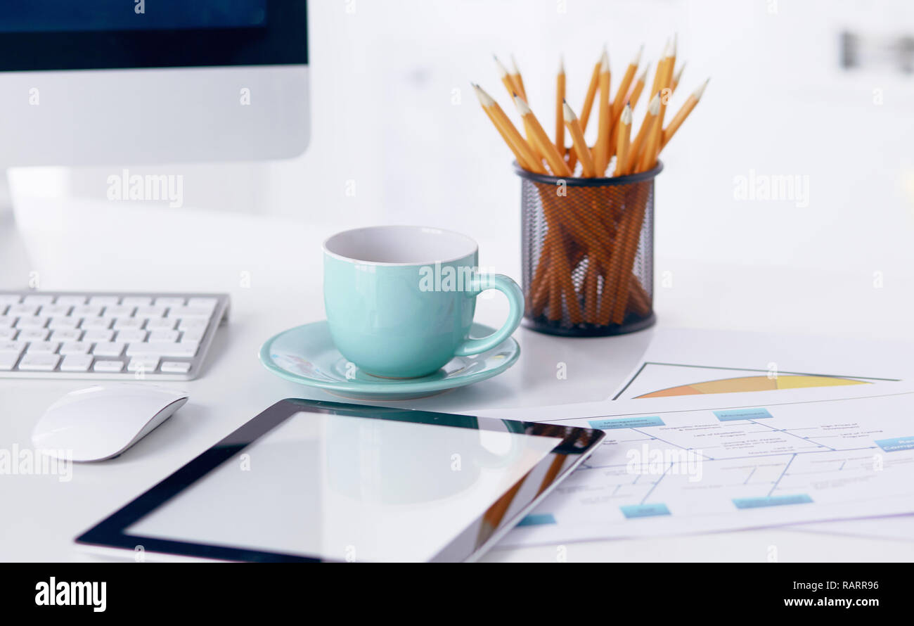 A cup of coffee on the office table Stock Photo - Alamy