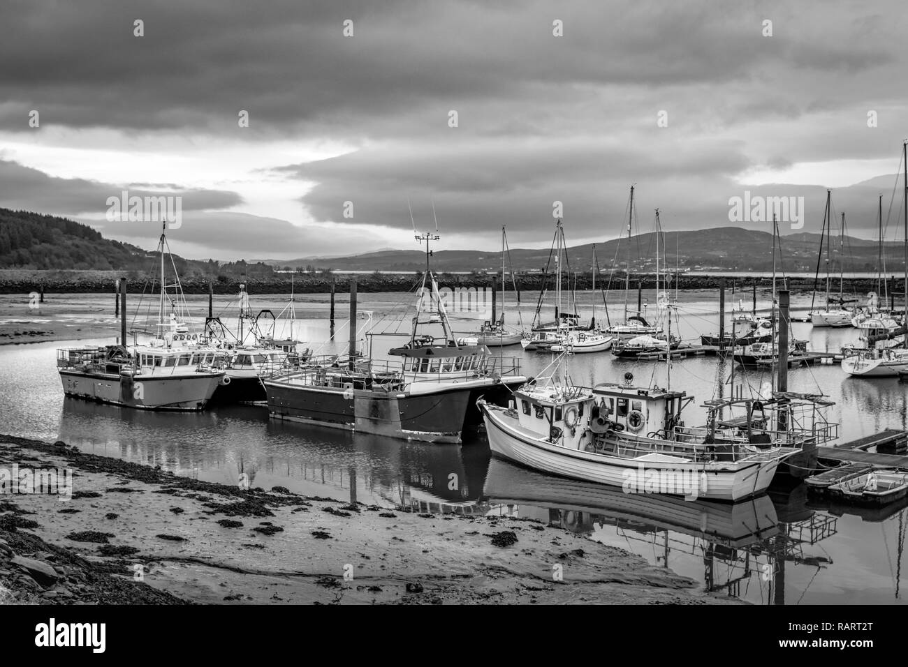 Fishing boats in a harbour in Ireland Stock Photo