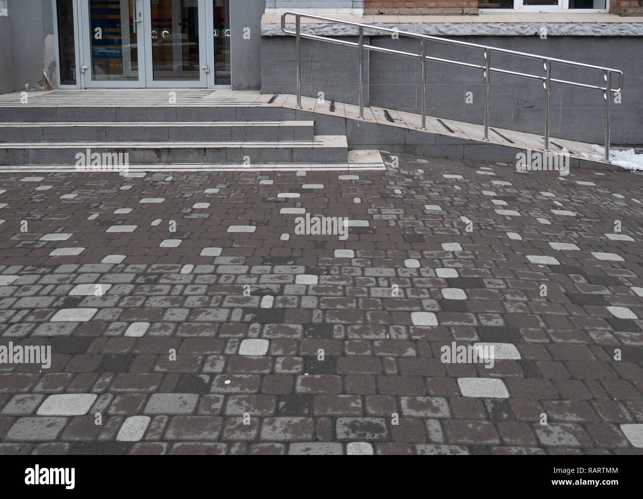 entrance to city store with special ramp for support disabled people using wheelchair Stock