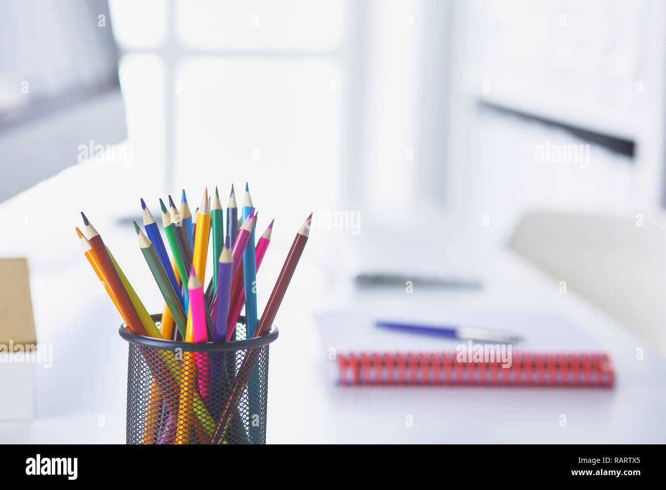 Graphite pencils in a metal gridcontainer on the office table. Concept Stock Photo Alamy