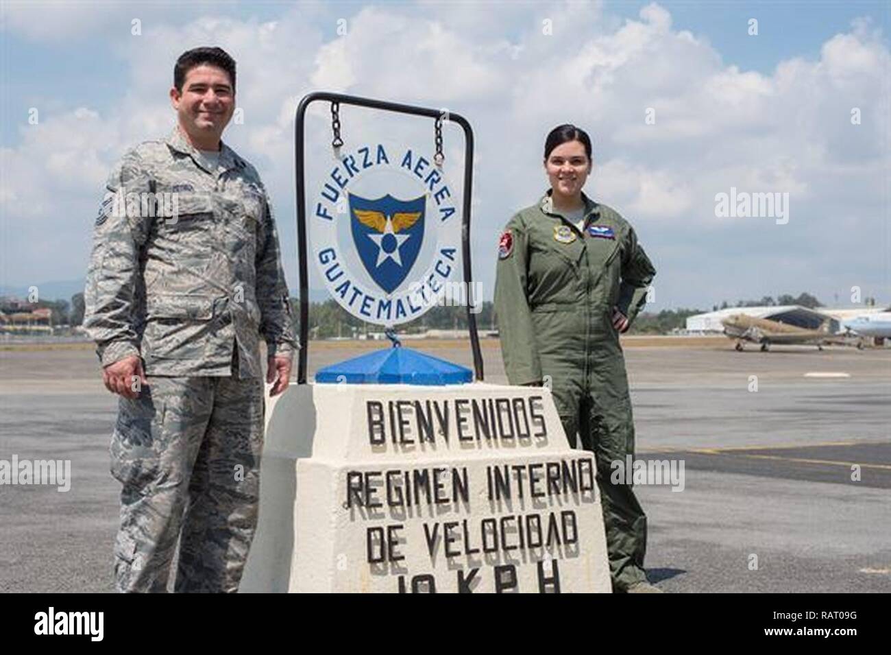 Master Sgt. Alejandro Medina, 571st Mobility Support Advisory Squadron air advisor, takes a picture with his daughter Senior Airman Giannina, sensor operator at Creech AFB, Nevada, during a training mission at La Aurora Air Base, Guatemala. Stock Photo