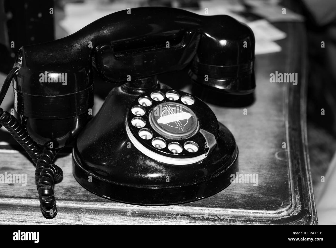 Photo of a vintage telephone, captured in black and white Stock Photo