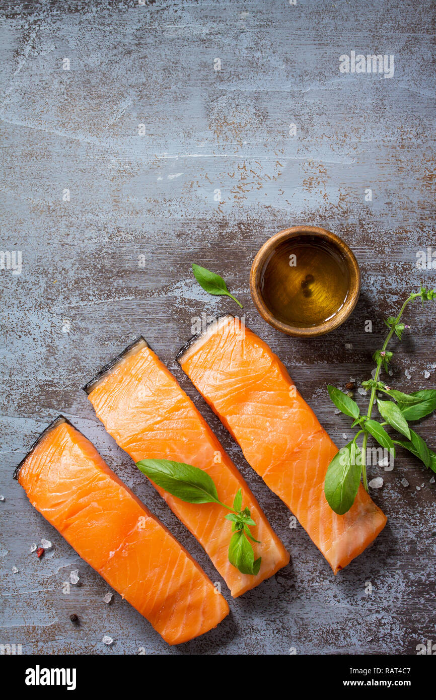 Fresh Fish. Raw Salmon Fillet on a dark metallic background. Top view ...