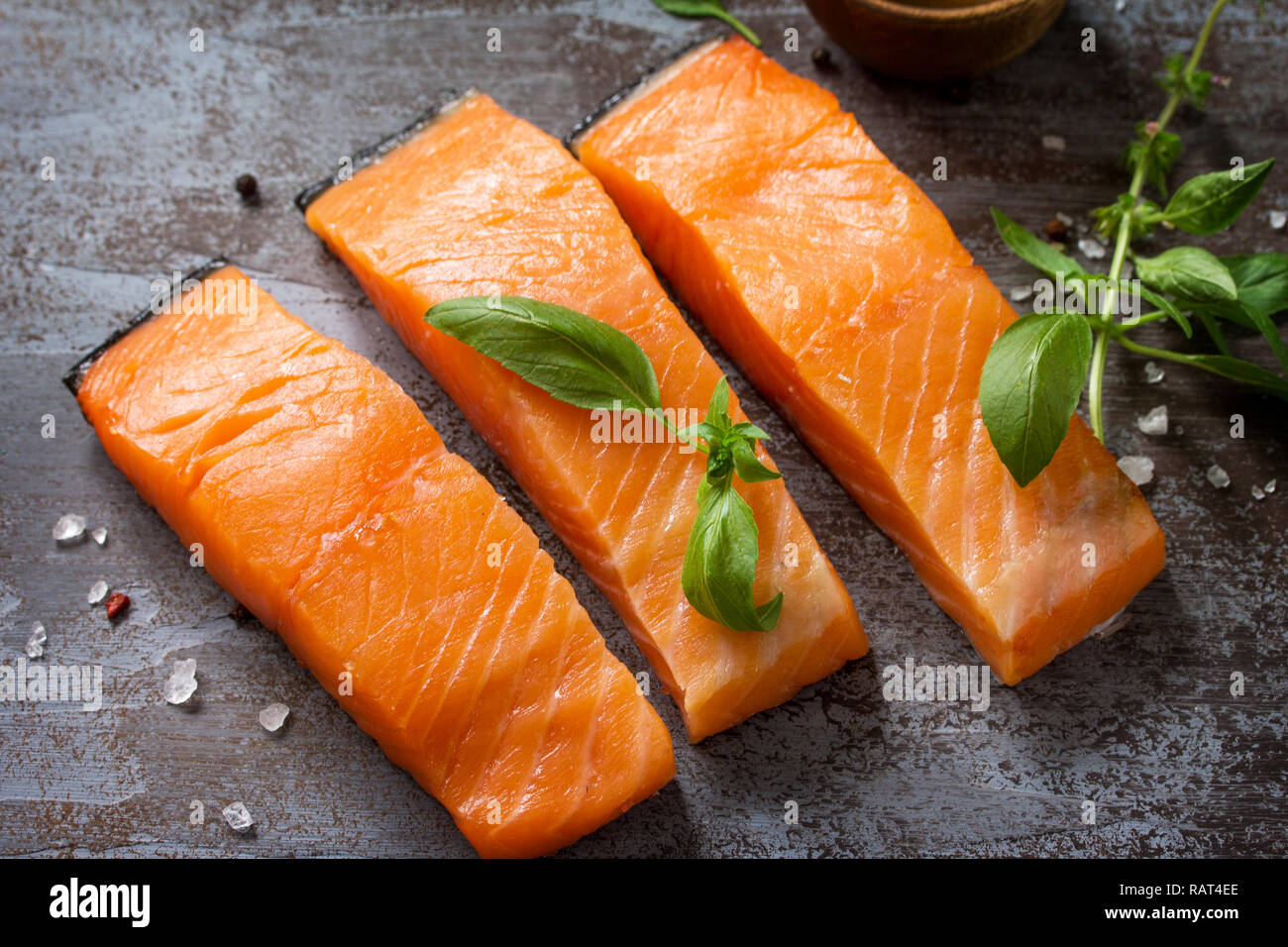 Fresh Fish. Raw Salmon Fillet on a dark stone table Stock Photo - Alamy