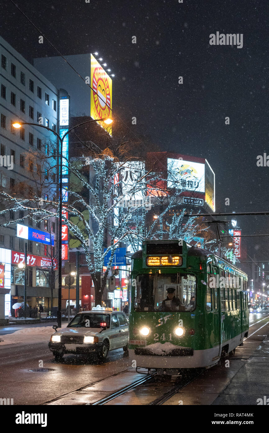 Tram in Sapporo at night Stock Photo - Alamy