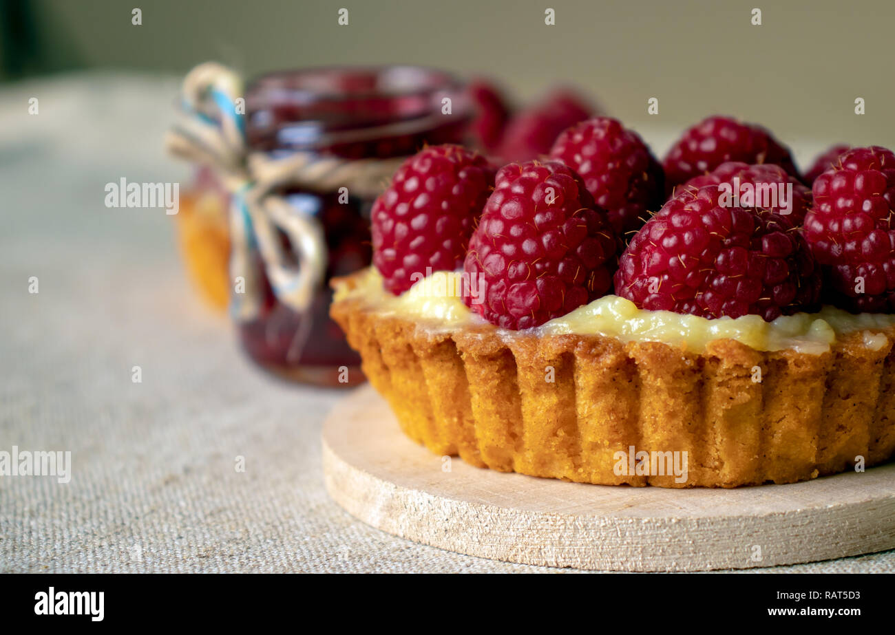 Raspberry cake and raspberry jam close-up Stock Photo - Alamy