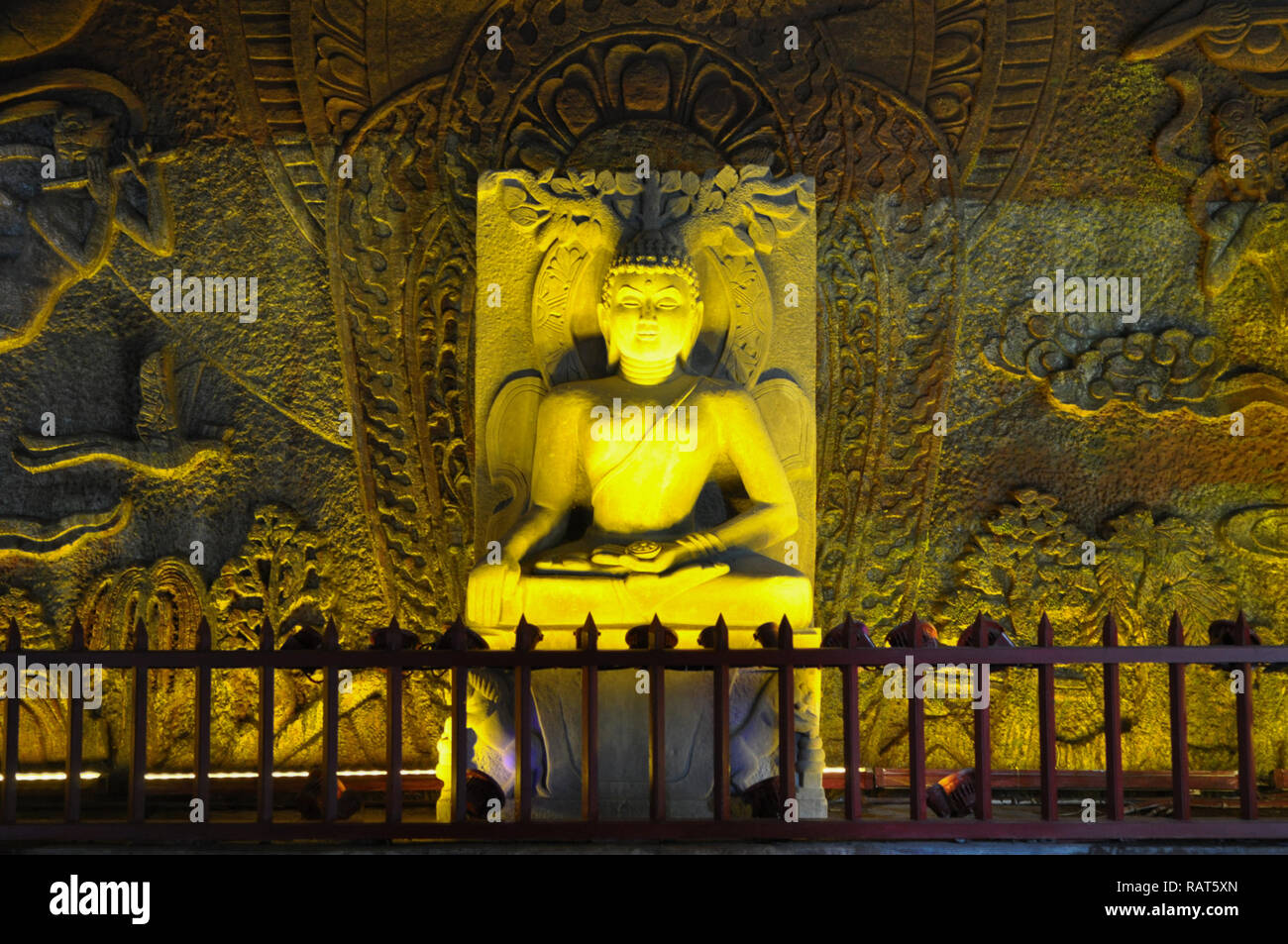 Buddha statue in the rock Stock Photo Alamy