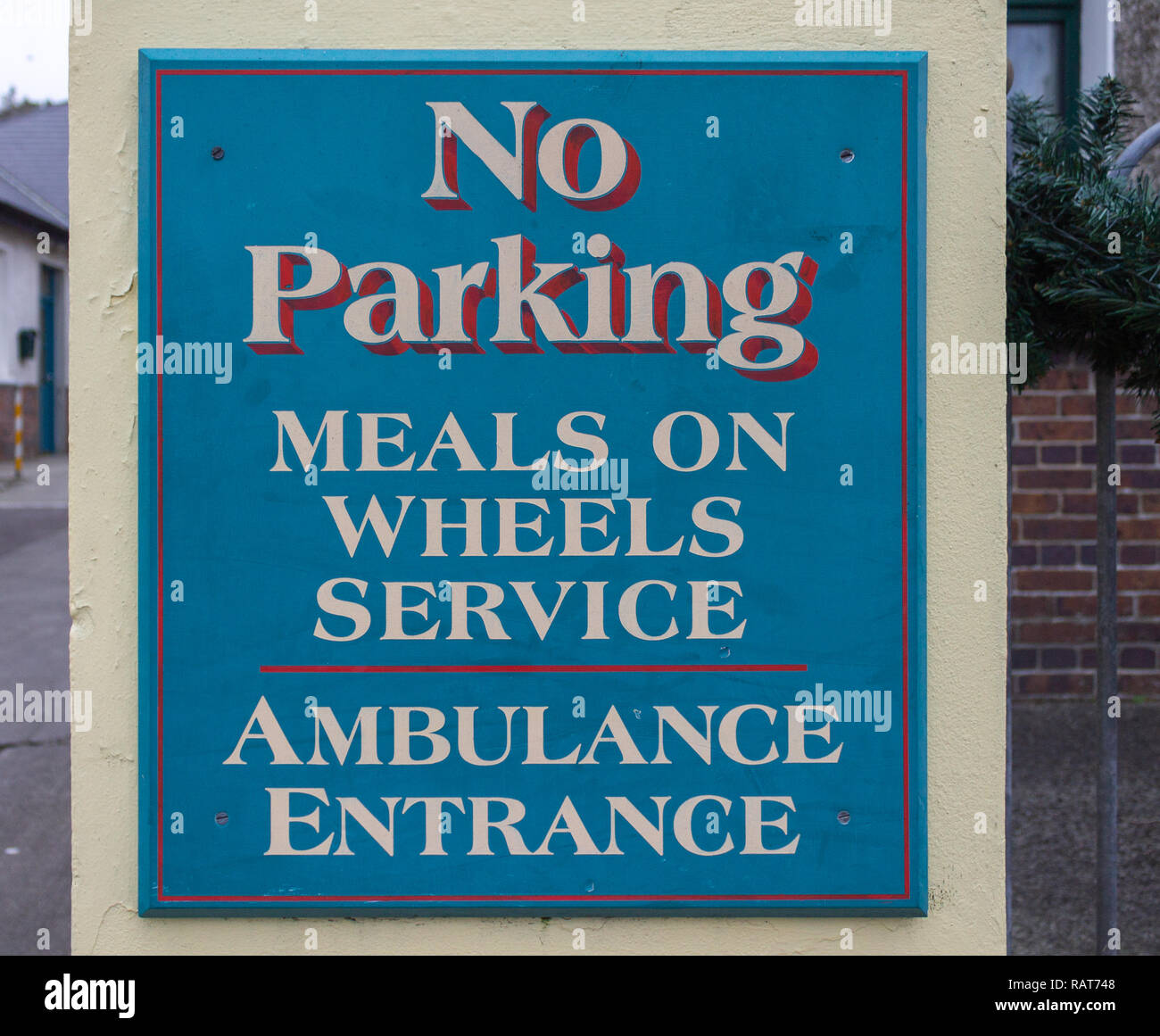 parking restriction sign for meals on wheels service. Stock Photo