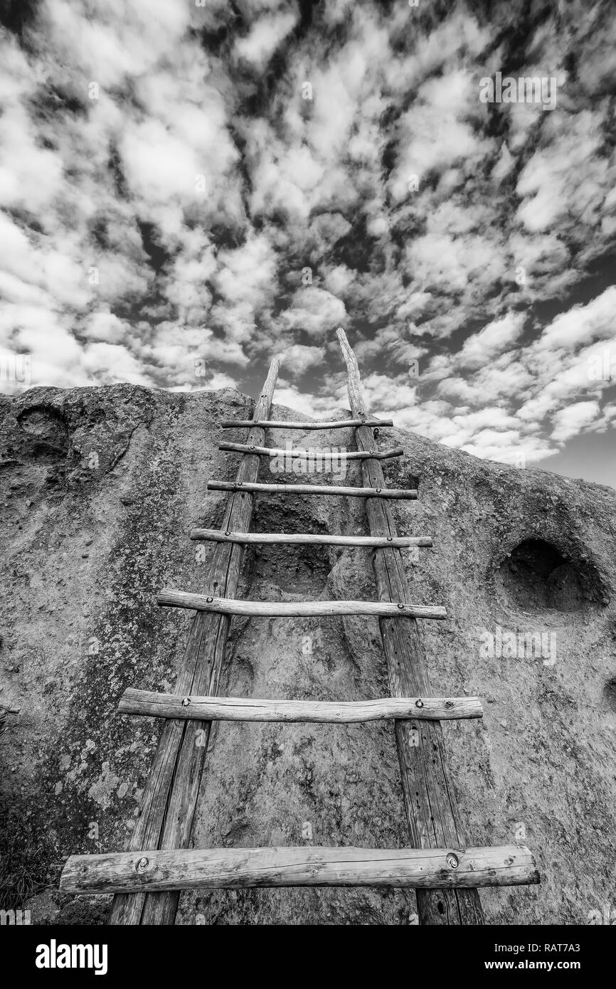 Wooden ladder reminiscent of a prehistoric ladder the Tsankawi Prehistoric Sites in Bandelier National Monument near Los Alamos, New Mexico Stock Photo