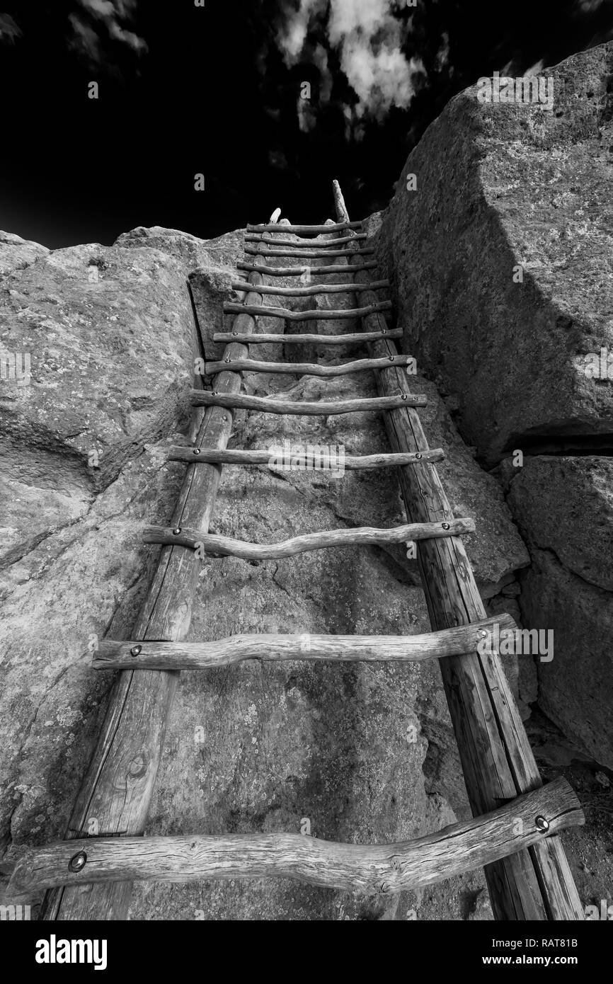 Traditional-looking ladder along trail at the Tsankawi Prehistoric Sites in Bandelier National Monument near Los Alamos, New Mexico Stock Photo