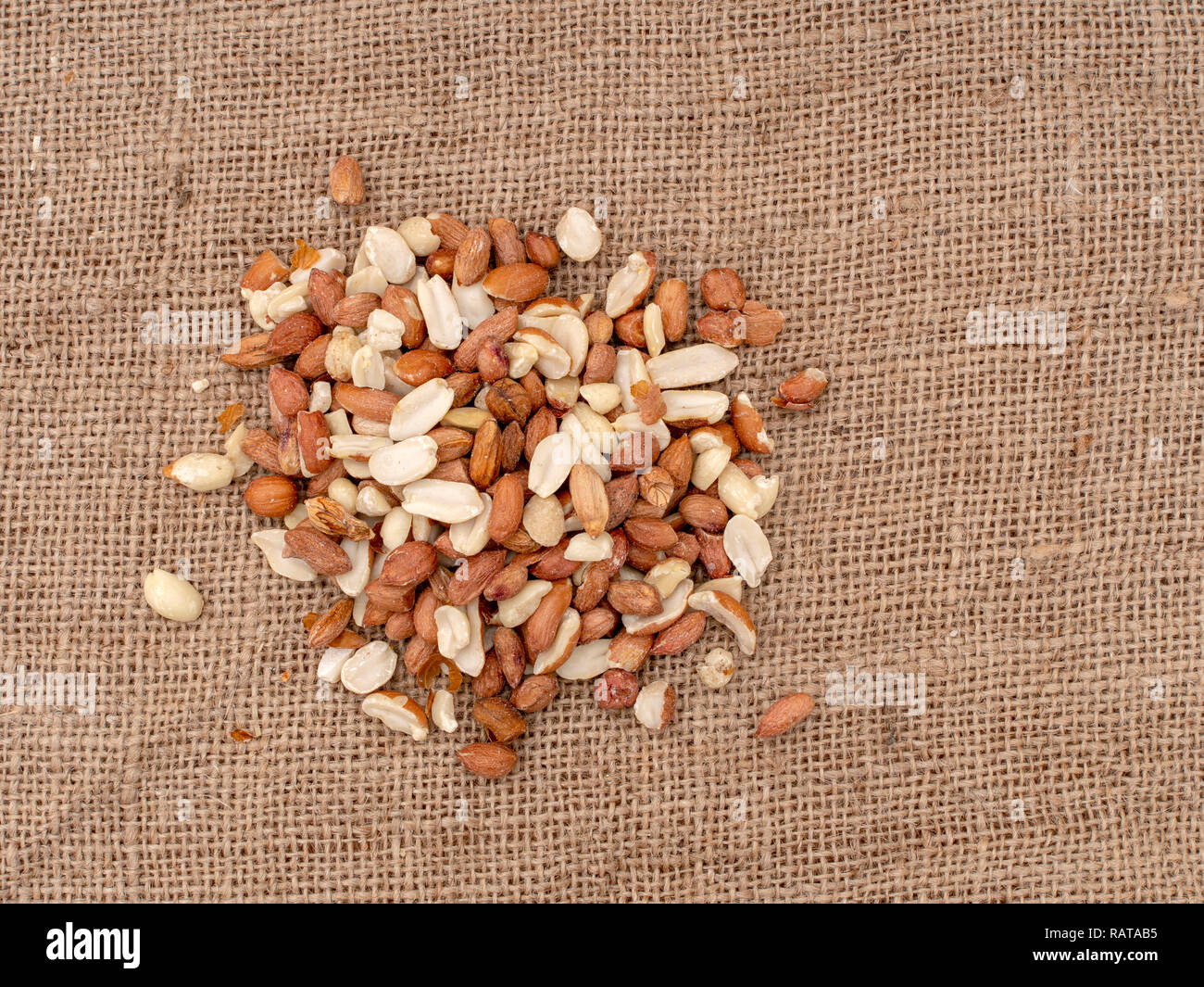 Wild bird food unsalted peanuts, on hessian. Help feed garden birds