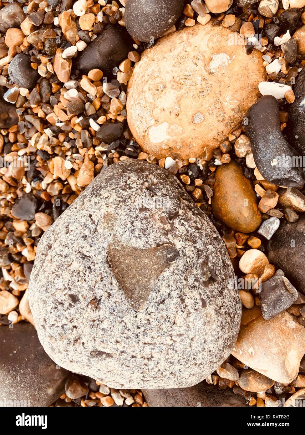 A love heart shape on a pebble Stock Photo