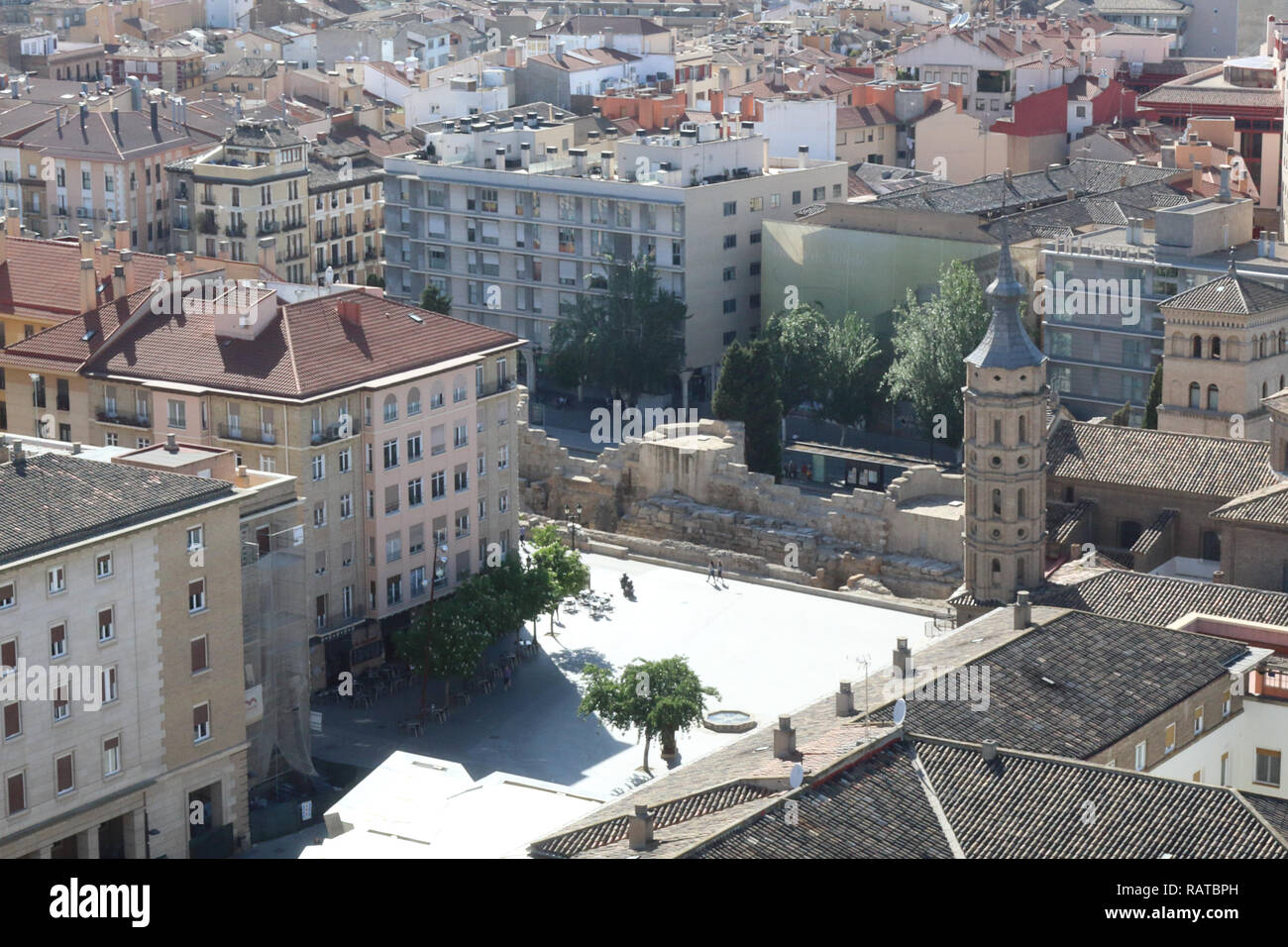 An air view of the the ancient roman walls, next to San Juan de los Panetes church bell tower, in Plaza Cesar Augusto, in Zaragoza, Aragon, Spain Stock Photo