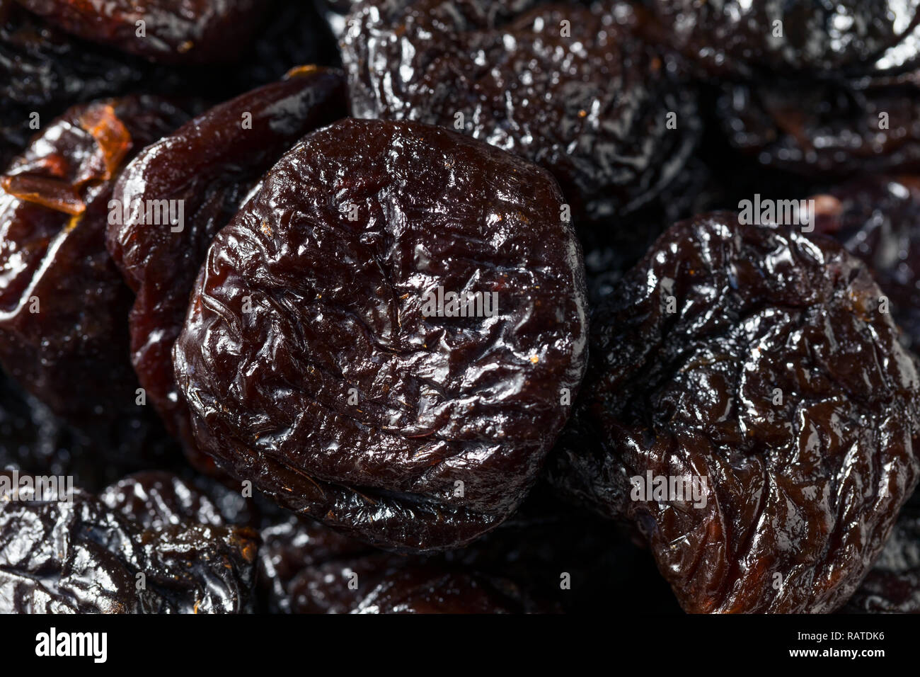 Raw Organic Dry Prunes in a Bowl Stock Photo Alamy