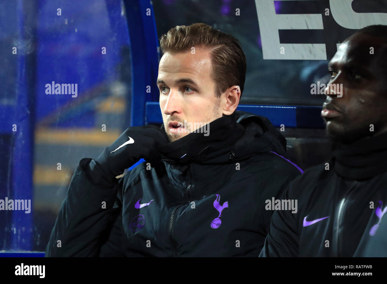 Tottenham Hotspur's Harry Kane in the dugout during the Emirates FA Cup, third round match at Prenton Park, Birkenhead. Stock Photo