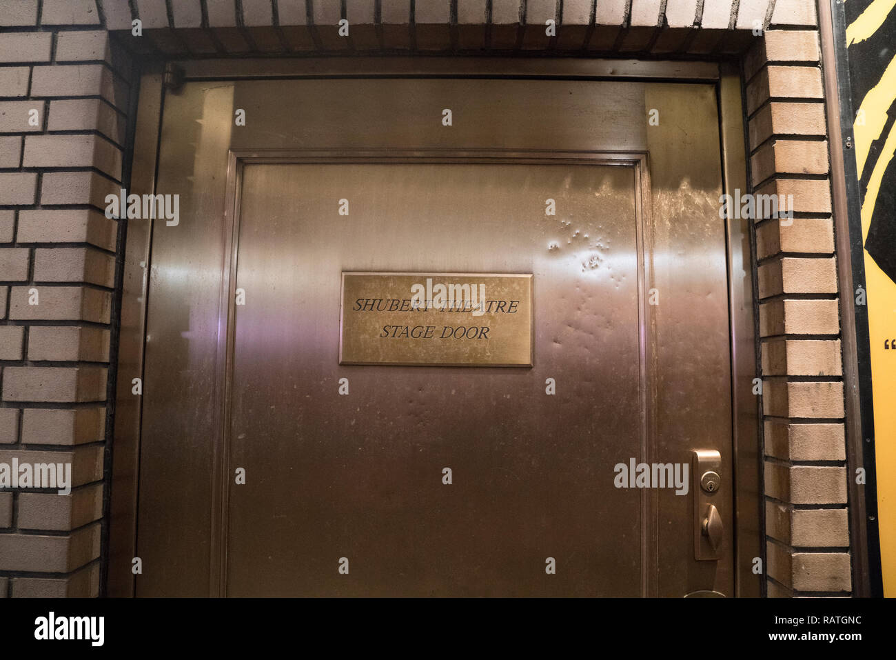 The stage door of the Schubert Theatre at 225 West 44th Street in midtown Manhattan. The theatre opened in 1913 and is a New York City landmark. Stock Photo
