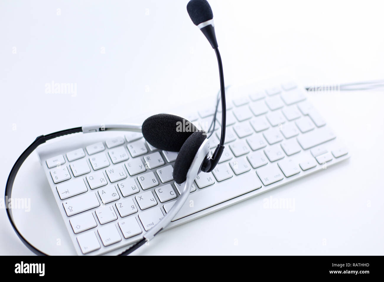 Call center and customer service help desk. VOIP headset on laptop ...